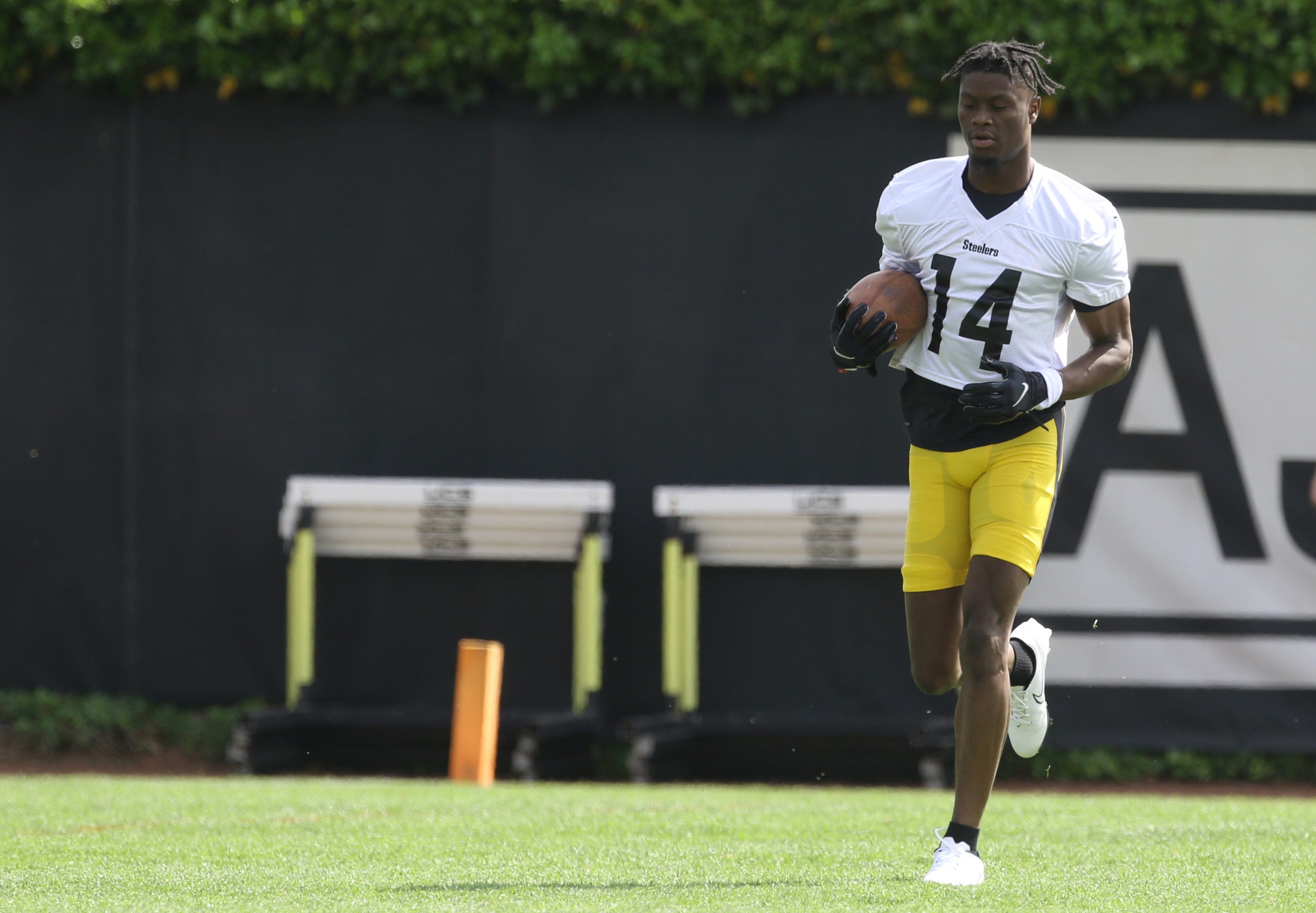 May 24, 2022; Pittsburgh, PA, USA;  Pittsburgh Steelers wide receiver George Pickens (14) participates in organized team activities at UPMC Rooney Sports Complex. Mandatory Credit: Charles LeClaire-USA TODAY Sports