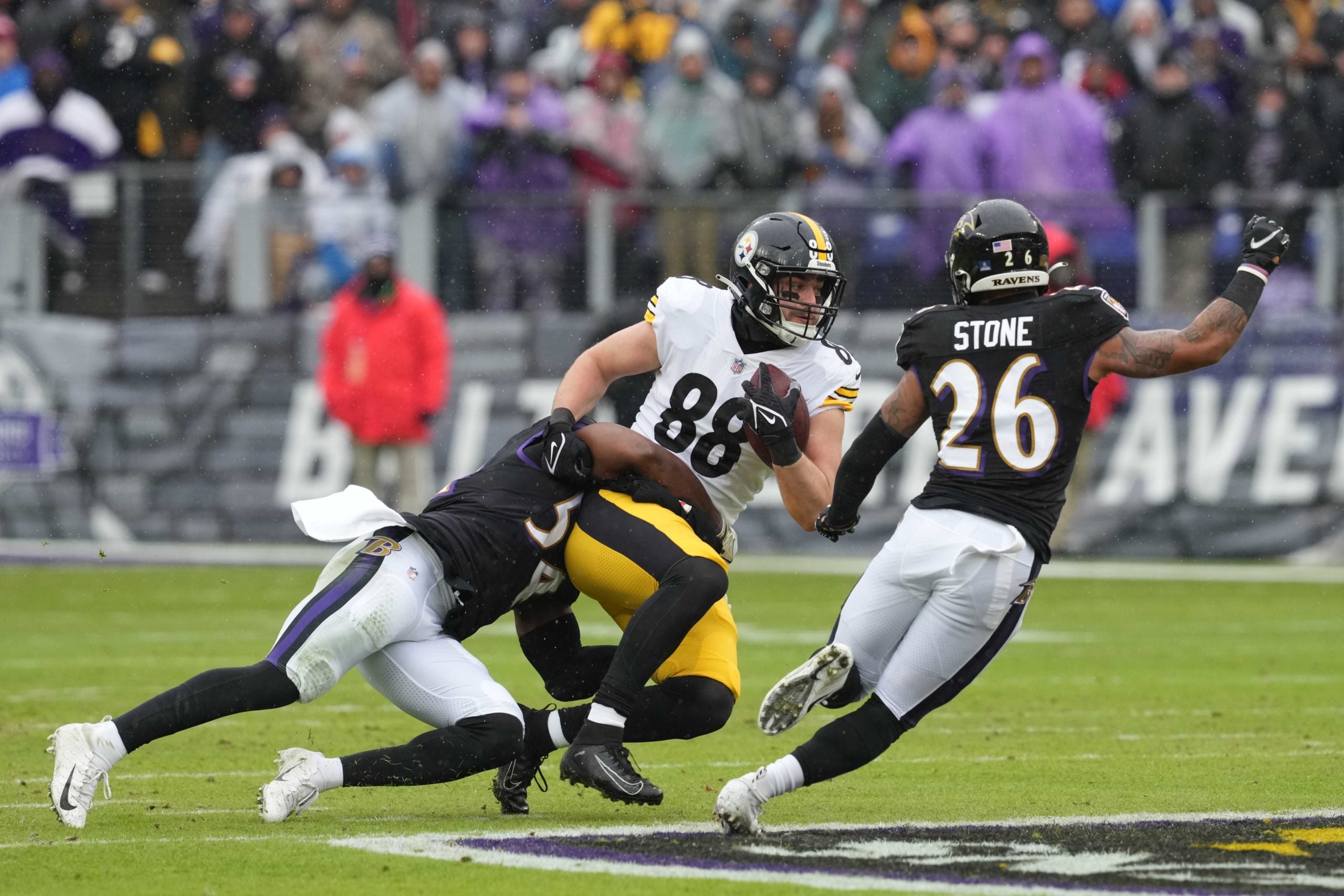 Jan 9, 2022; Baltimore, Maryland, USA; Pittsburgh Steelers tight end Pat Freiermuth (88) runs the ball in the first quarter against Baltimore Ravens linebacker Tyus Bowser (54) at M&T Bank Stadium. Mandatory Credit: Mitch Stringer-USA TODAY Sports