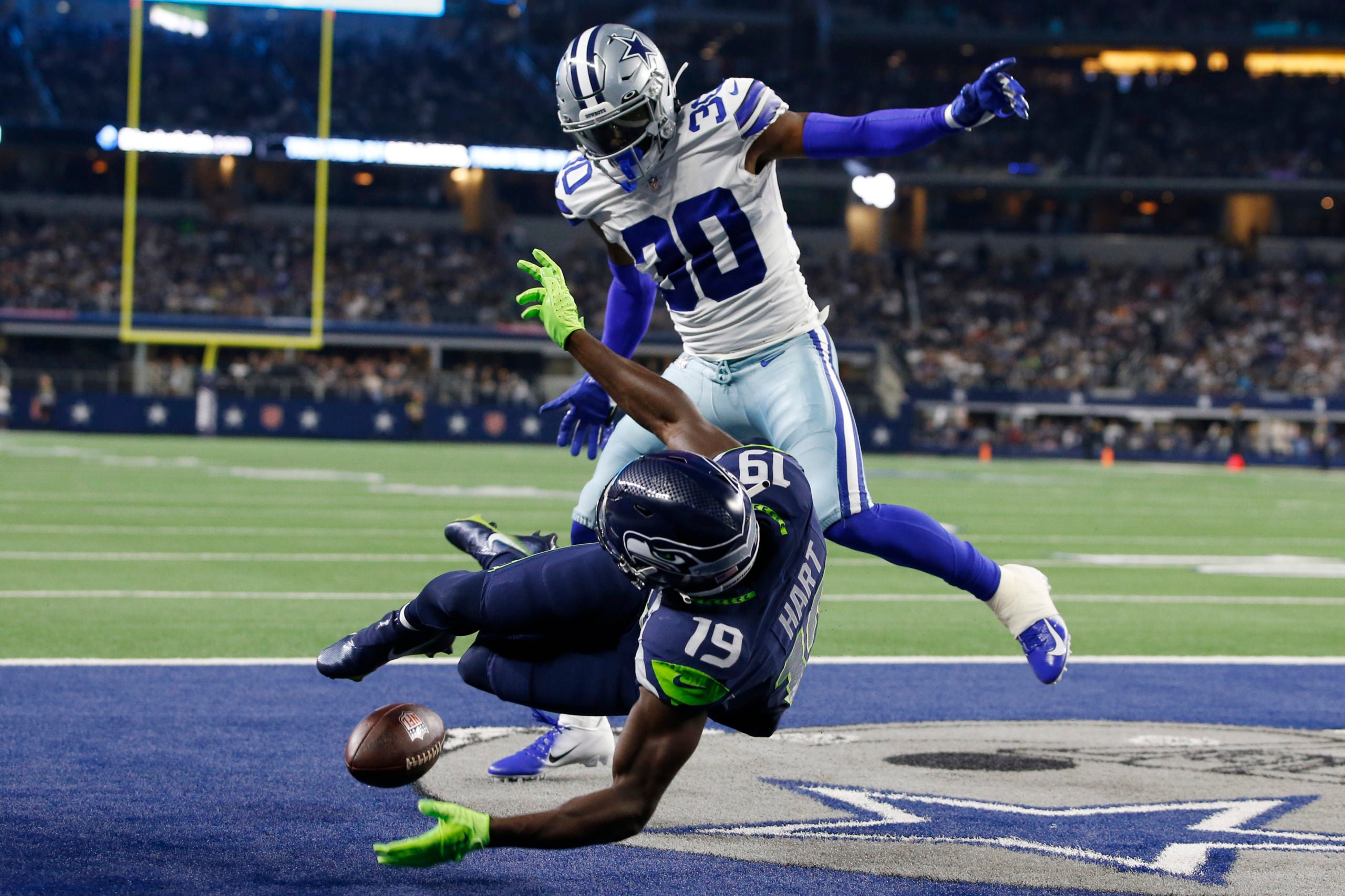 Aug 26, 2022; Arlington, Texas, USA; Seattle Seahawks wide receiver Penny Hart (19) cannot catch a pass while defended by Dallas Cowboys cornerback DaRon Bland (30) in the second quarter at AT&T Stadium. Mandatory Credit: Tim Heitman-USA TODAY Sports