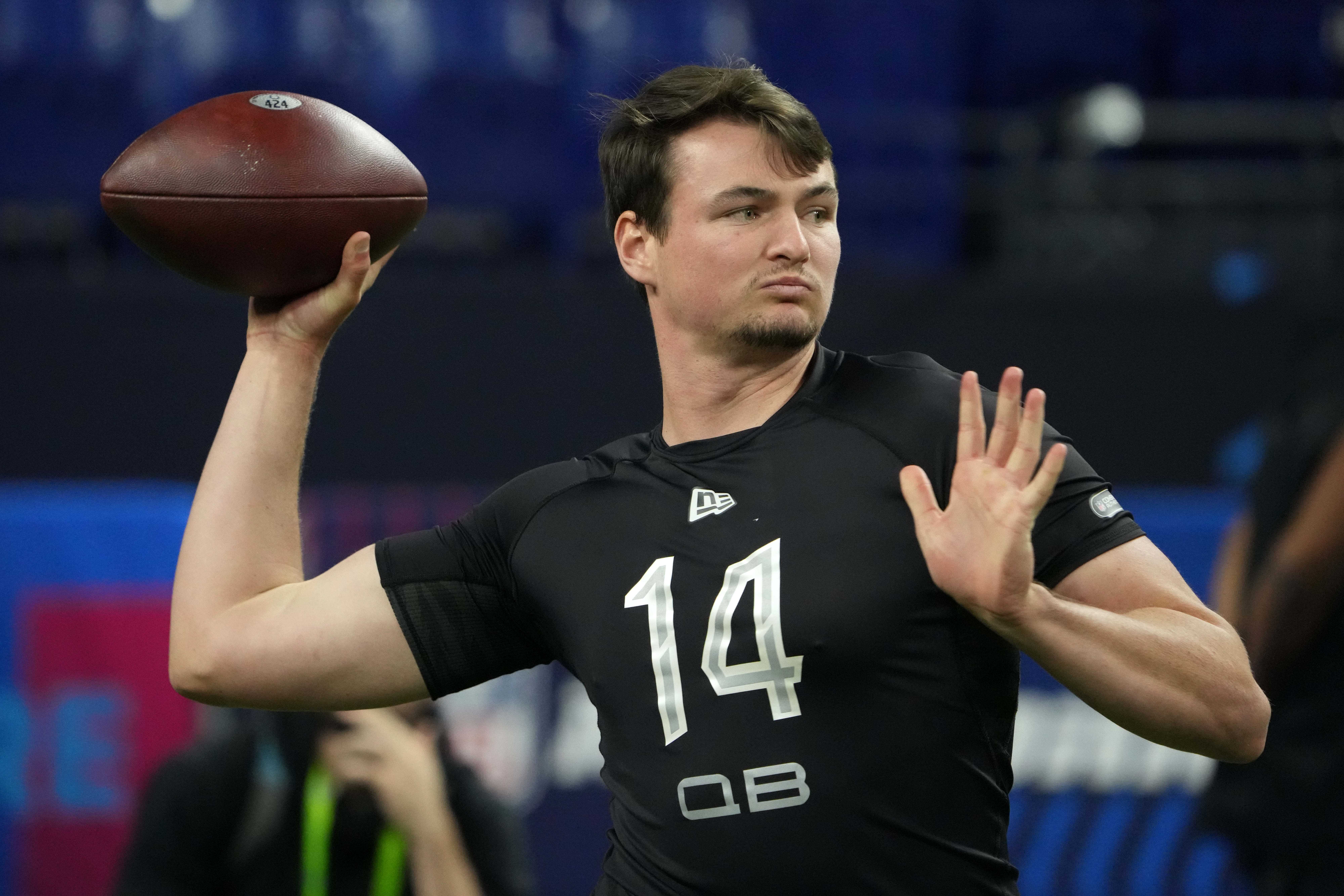 Mar 3, 2022; Indianapolis, IN, USA; Nevada Wolfpack quarterback Carson Strong  throws the ball during the NFL Scouting Combine at Lucas Oil Stadium. Mandatory Credit: Kirby Lee-USA TODAY Sports
