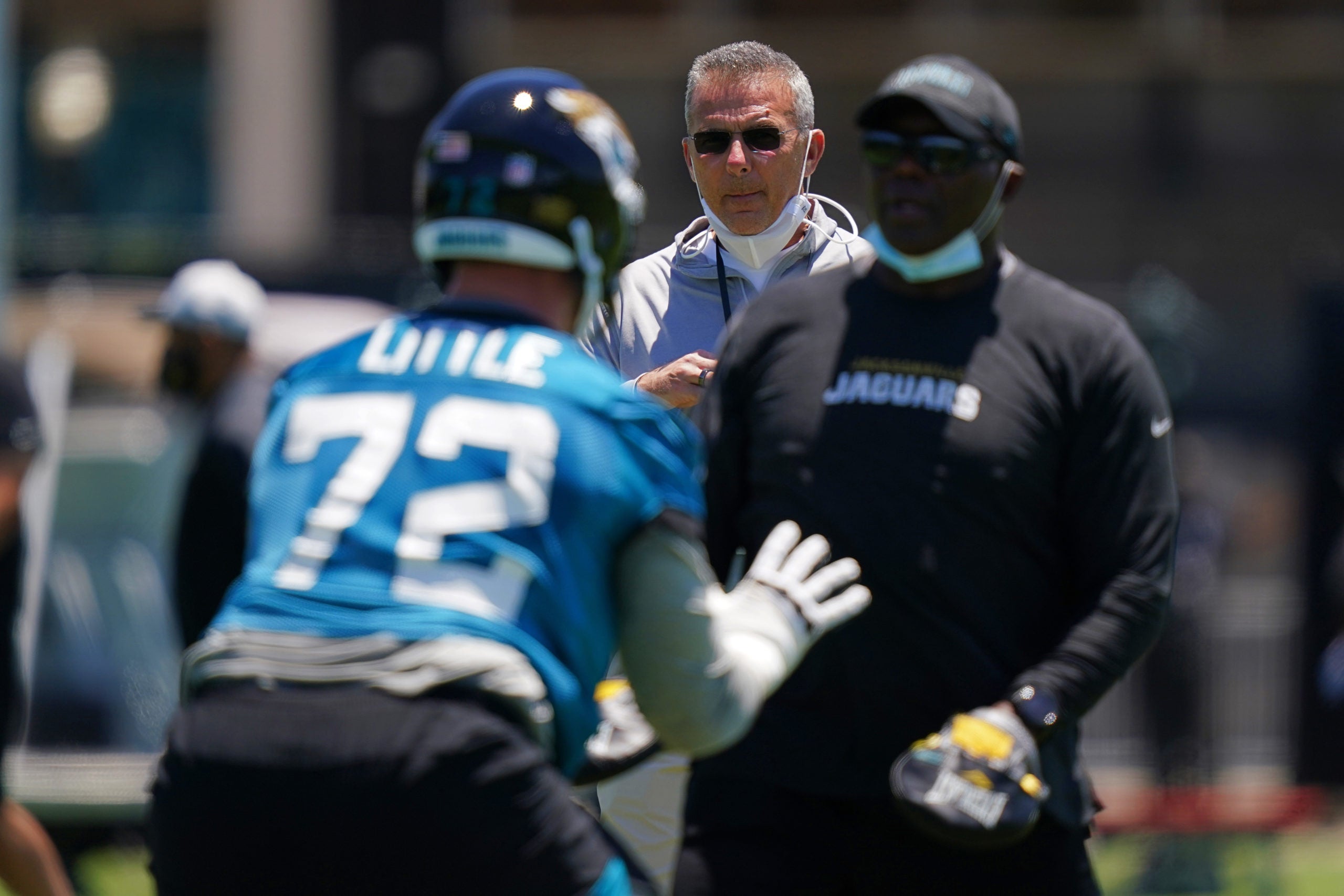 May 15, 2021; Jacksonville, Florida, USA; Jacksonville Jaguars head coach Urban Meyer watches as offensive lineman Walker Little (72) runs a drill during rookie mini camp at TIAA Bank Field. Mandatory Credit: Jasen Vinlove-USA TODAY Sports