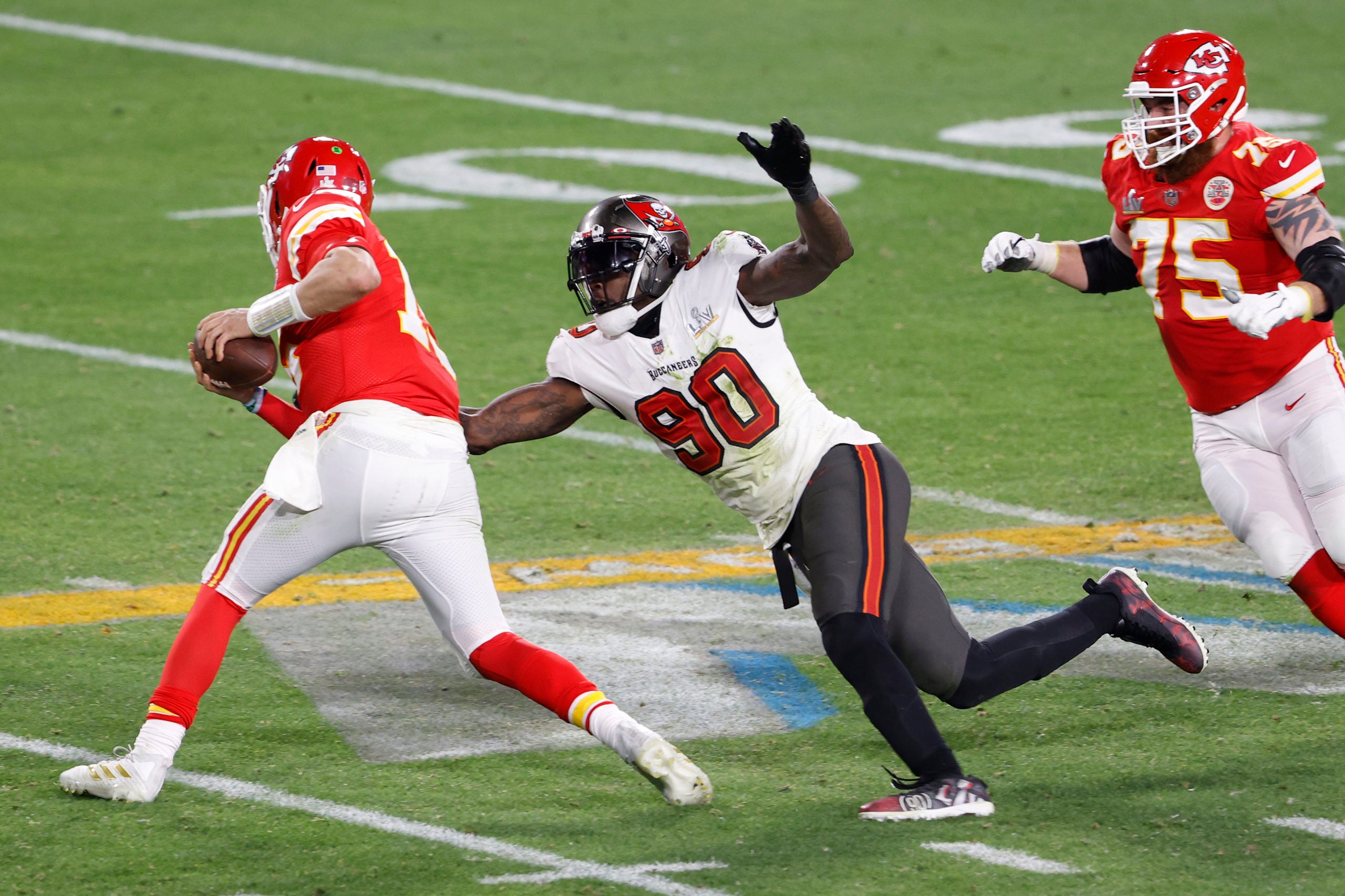 Feb 7, 2020; Tampa, FL, USA; Tampa Bay Buccaneers outside linebacker Jason Pierre-Paul (90) pressures Kansas City Chiefs quarterback Patrick Mahomes (15) during the fourth quarter of Super Bowl LV at Raymond James Stadium. Mandatory Credit: Kim Klement-USA TODAY Sports
