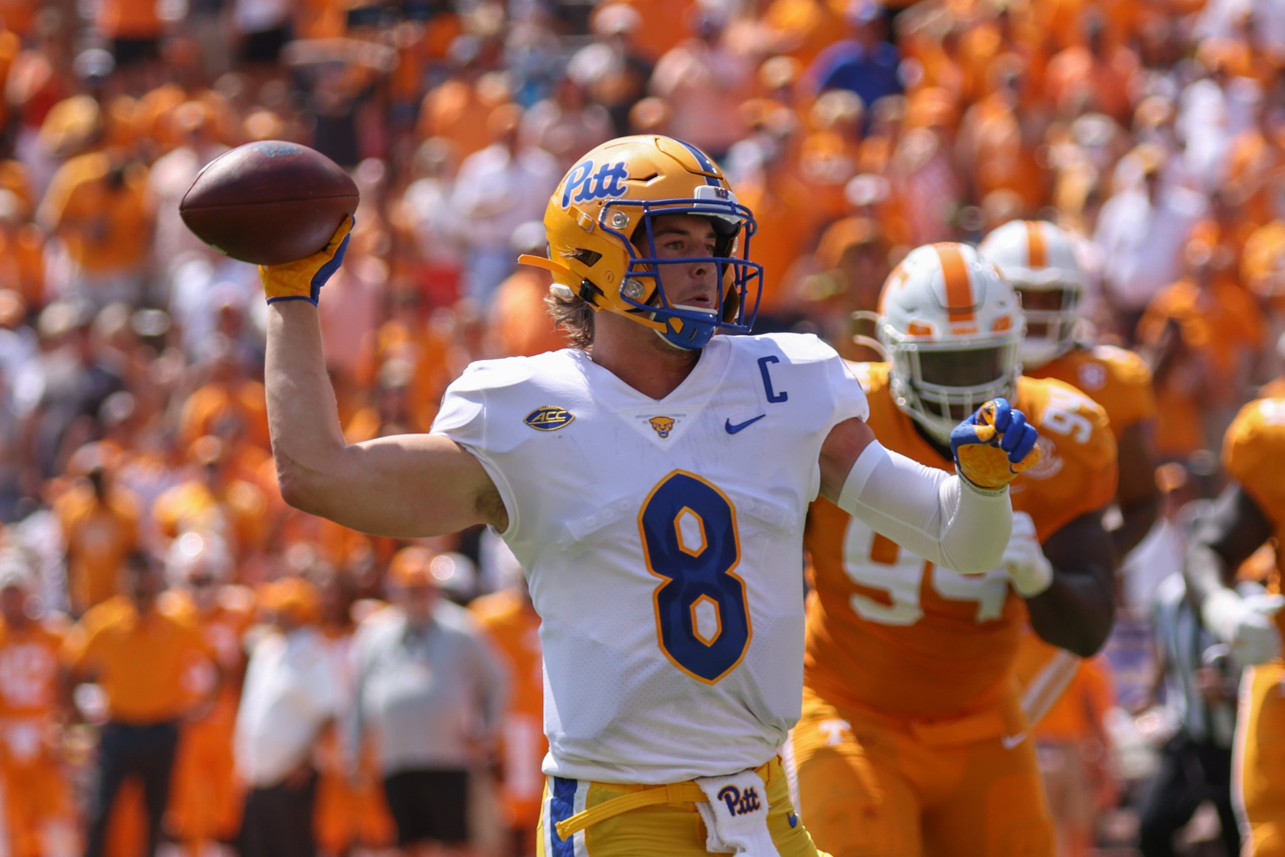 Sep 11, 2021; Knoxville, Tennessee, USA; Pittsburgh Panthers quarterback Kenny Pickett (8) throws a touchdown pass against the Tennessee Volunteers during the second quarter at Neyland Stadium. Mandatory Credit: Randy Sartin-USA TODAY Sports