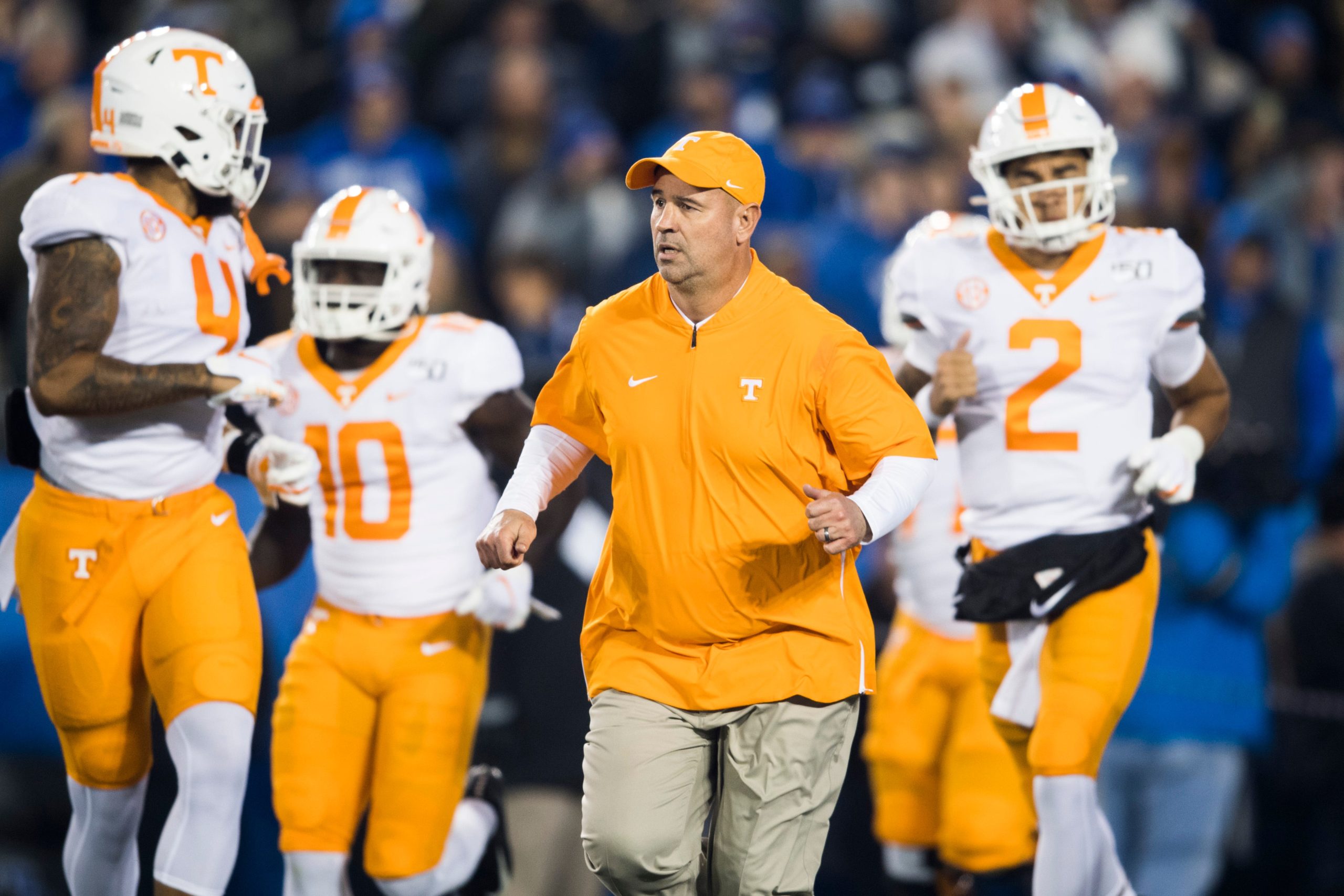 Tennessee football coach Jeremy Pruitt runs onto the field during a game between Tennessee and Kentucky at Kroger Field in Lexington, Ky., Saturday, Nov. 9, 2019. Calvinutvuk1109 0532