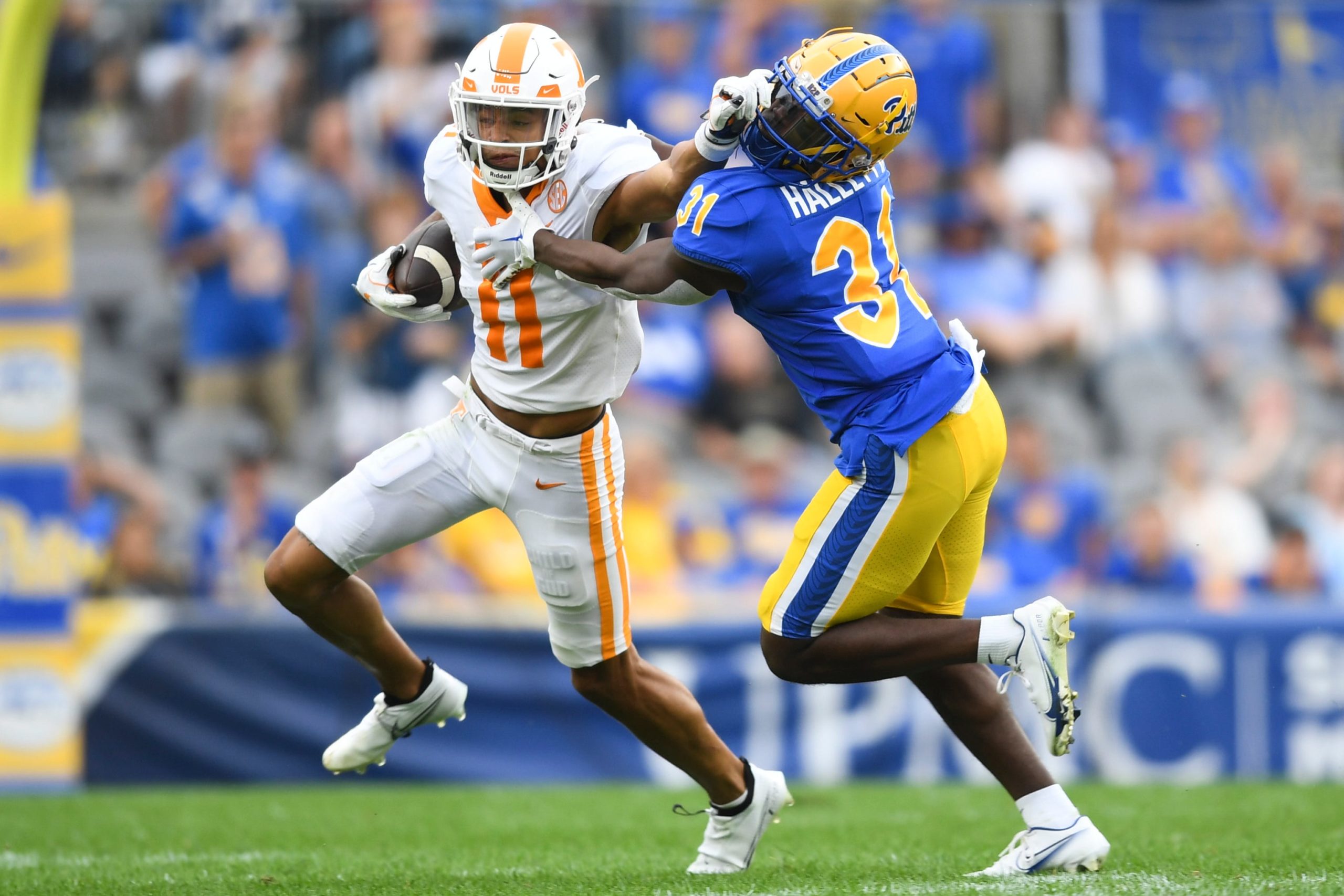Pittsburgh defensive back Erick Hallett (31) attempts to tackle Tennessee wide receiver Jalin Hyatt (11) during the second half of a game between the Tennessee Volunteers and Pittsburgh Panthers in Acrisure Stadium in Pittsburgh, Saturday, Sept. 10, 2022. Tennessee defeated Pitt 34-27 in overtime. Tennpitt0910 03076