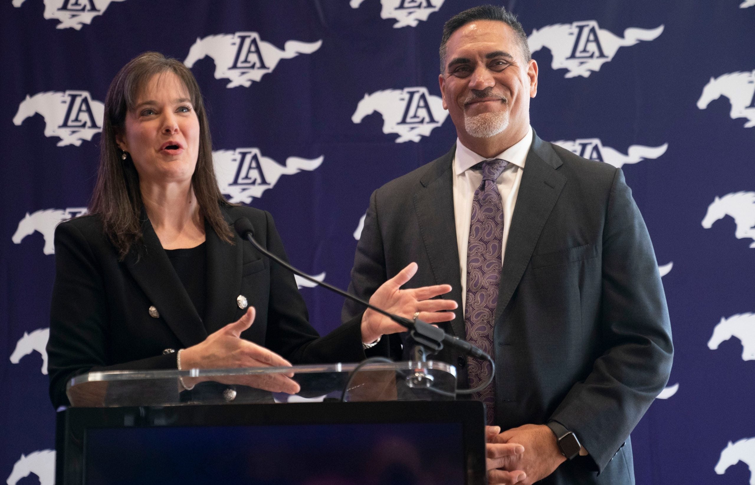 Lipscomb University president Candace McQueen presents Former Tennessee Titan Kevin Mawae as the new Lipscomb Academy head football coach during a press conference at Lipscomb University Tuesday, Jan. 24, 2023, in Nashville, Tenn. Nas Lipscomb Lipscomb 002