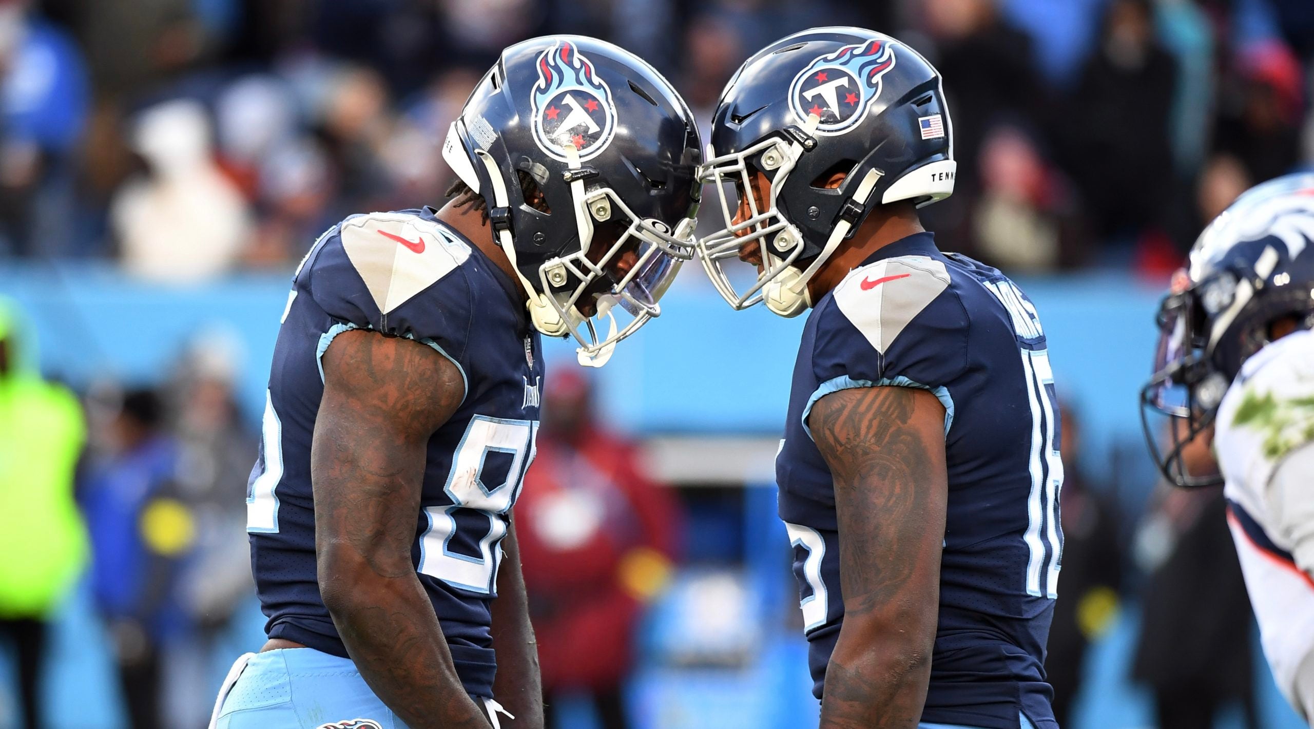 Nov 13, 2022; Nashville, Tennessee, USA; Tennessee Titans tight end Chigoziem Okonkwo (85) and wide receiver Treylon Burks (16) celebrate after a first down during the second half against the Denver Broncos at Nissan Stadium. Mandatory Credit: Christopher Hanewinckel-USA TODAY Sports