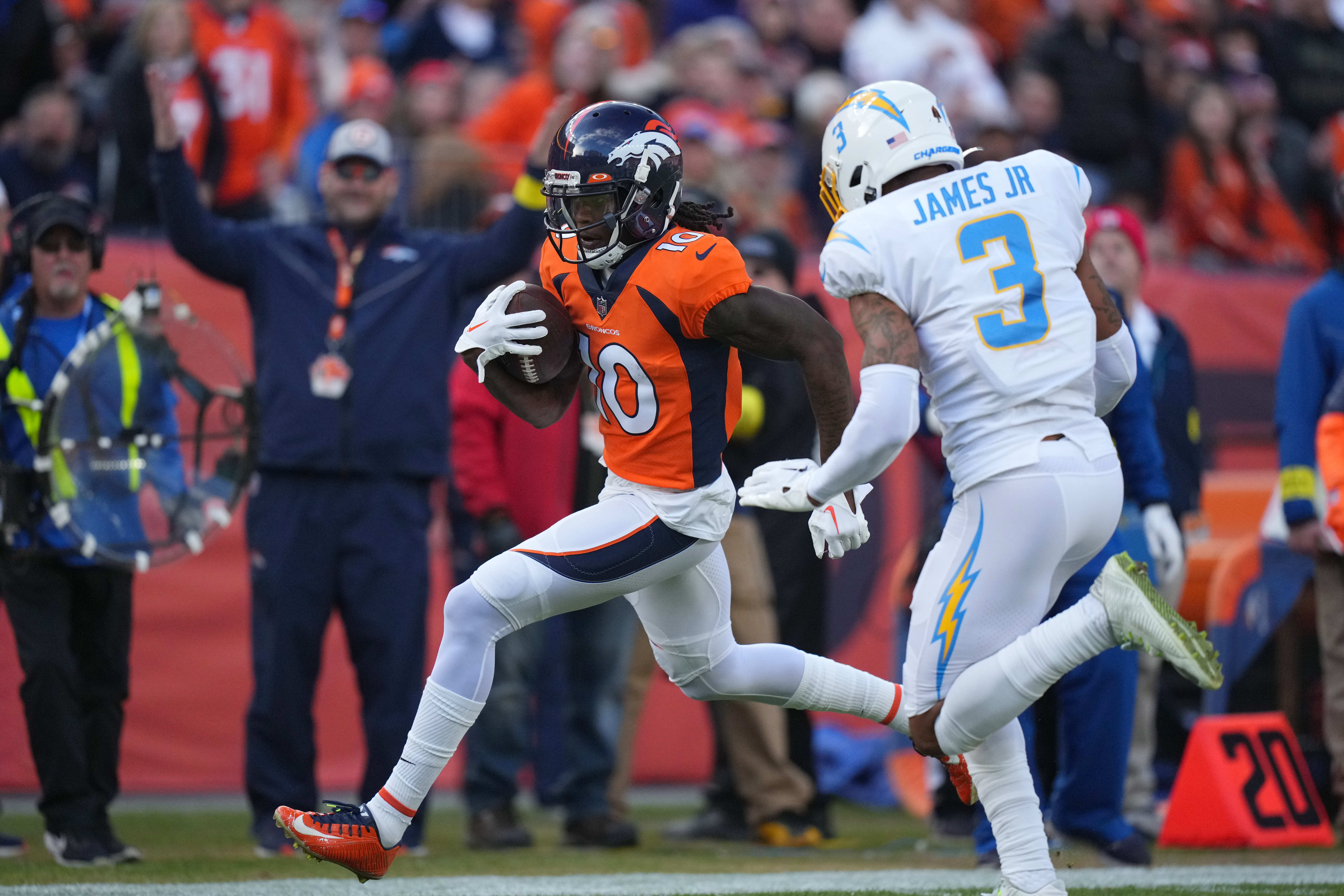Jan 8, 2023; Denver, Colorado, USA; Los Angeles Chargers safety Derwin James Jr. (3) chases Denver Broncos wide receiver Jerry Jeudy (10) in the first quarter at Empower Field at Mile High. Mandatory Credit: Ron Chenoy-USA TODAY Sports