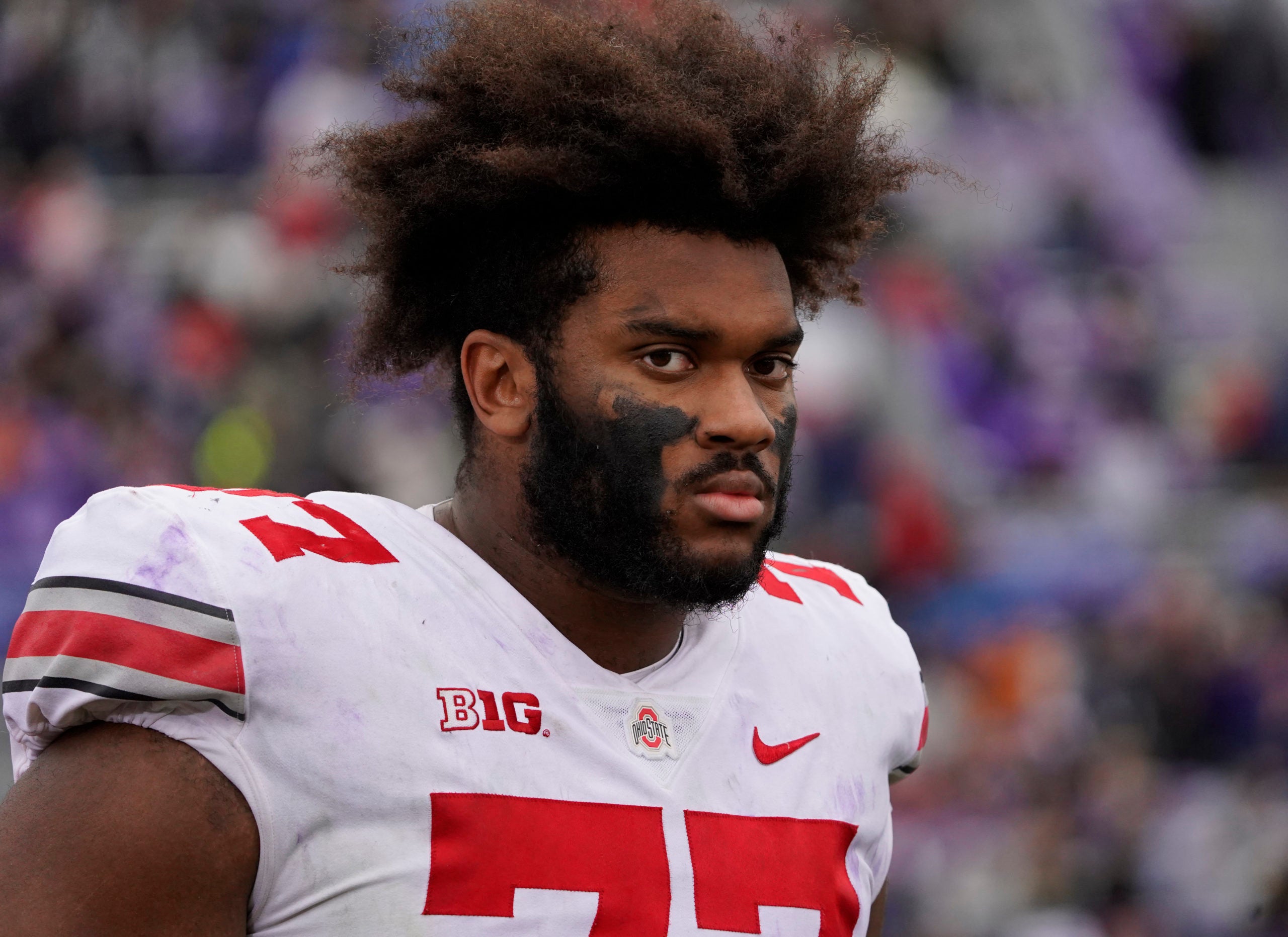 Nov 5, 2022; Evanston, Illinois, USA; Ohio State Buckeyes offensive lineman Paris Johnson Jr. (77) headshot during the second half at Ryan Field. Mandatory Credit: David Banks-USA TODAY Sports