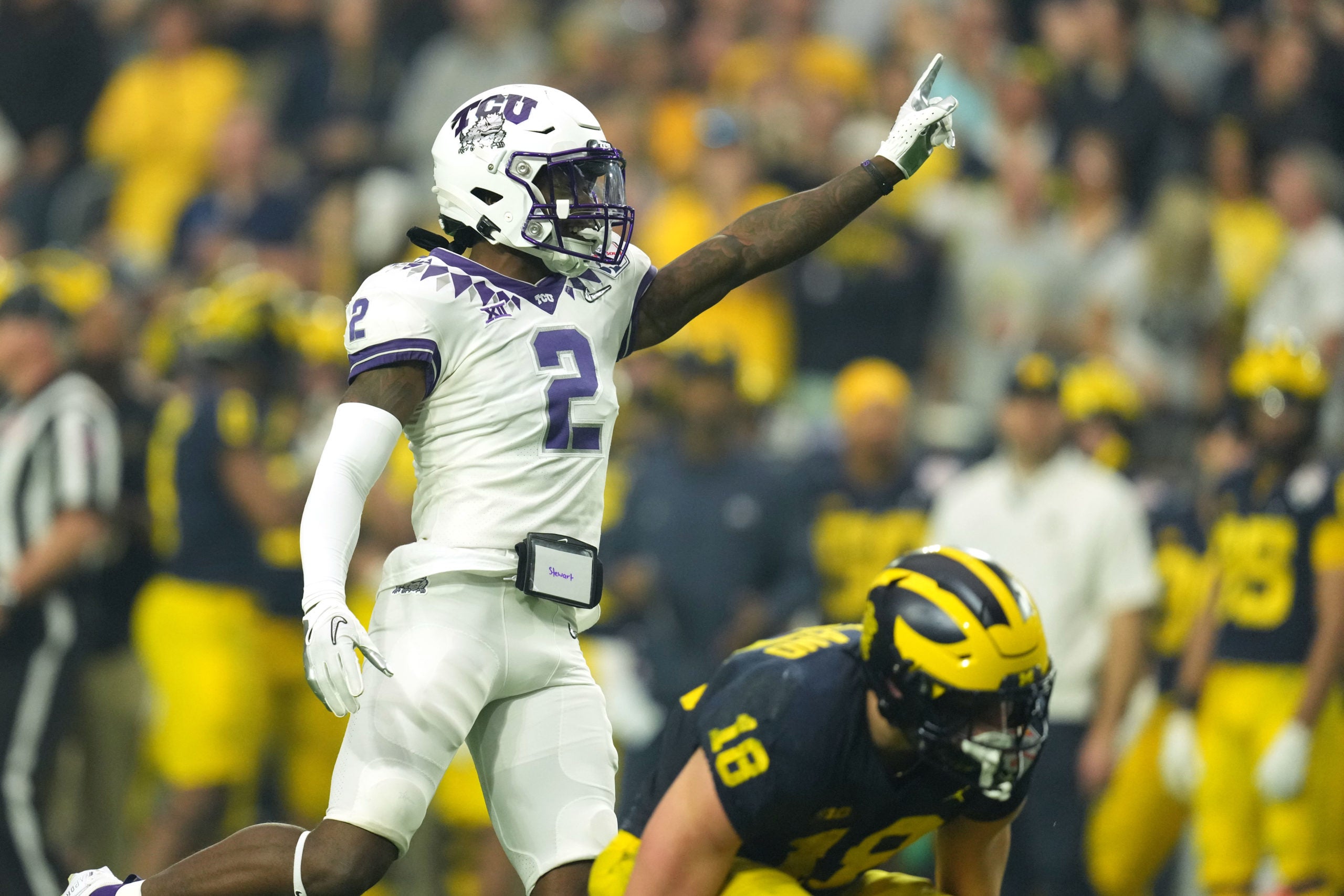 Dec 31, 2022; Glendale, Arizona, USA; TCU Horned Frogs cornerback Kee'Yon Stewart (2) gestures after a play against the Michigan Wolverines in the second quarter of the 2022 Fiesta Bowl at State Farm Stadium. Mandatory Credit: Kirby Lee-USA TODAY Sports