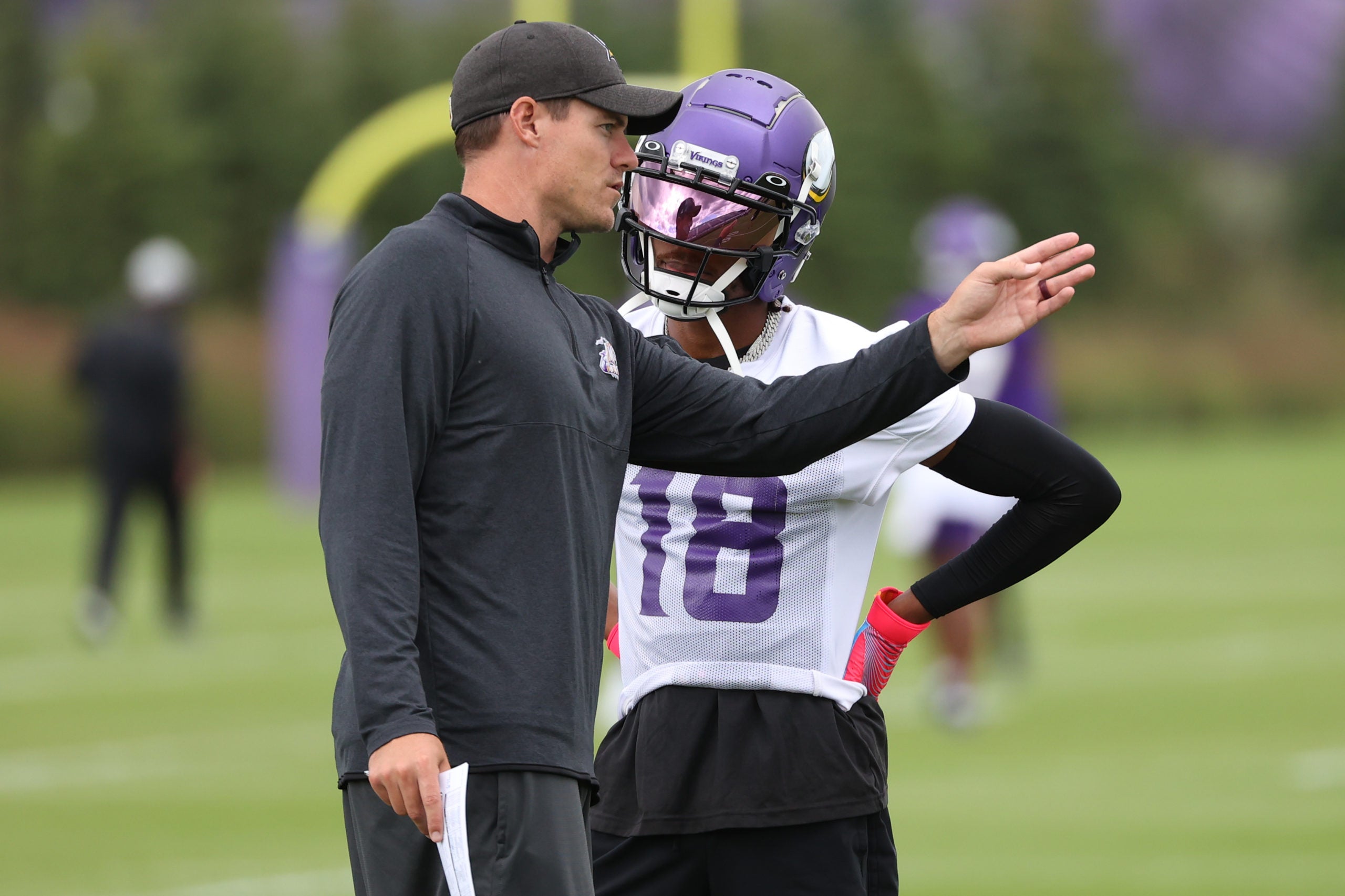 Jul 28, 2022; Minneapolis, MN, USA; Vikings head coach Kevin O'Connell and wide receiver Justin Jefferson (18) talk during training camp at TCO Performance Center. Mandatory Credit: Matt Krohn-USA TODAY Sports