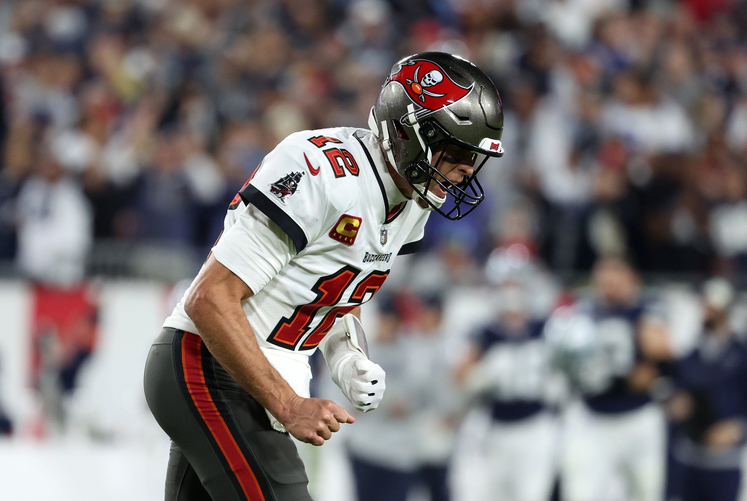 Jan 16, 2023; Tampa, Florida, USA; Tampa Bay Buccaneers quarterback Tom Brady (12) reacts against the Dallas Cowboys in the first half during the wild card game at Raymond James Stadium. Mandatory Credit: Kim Klement-USA TODAY Sports