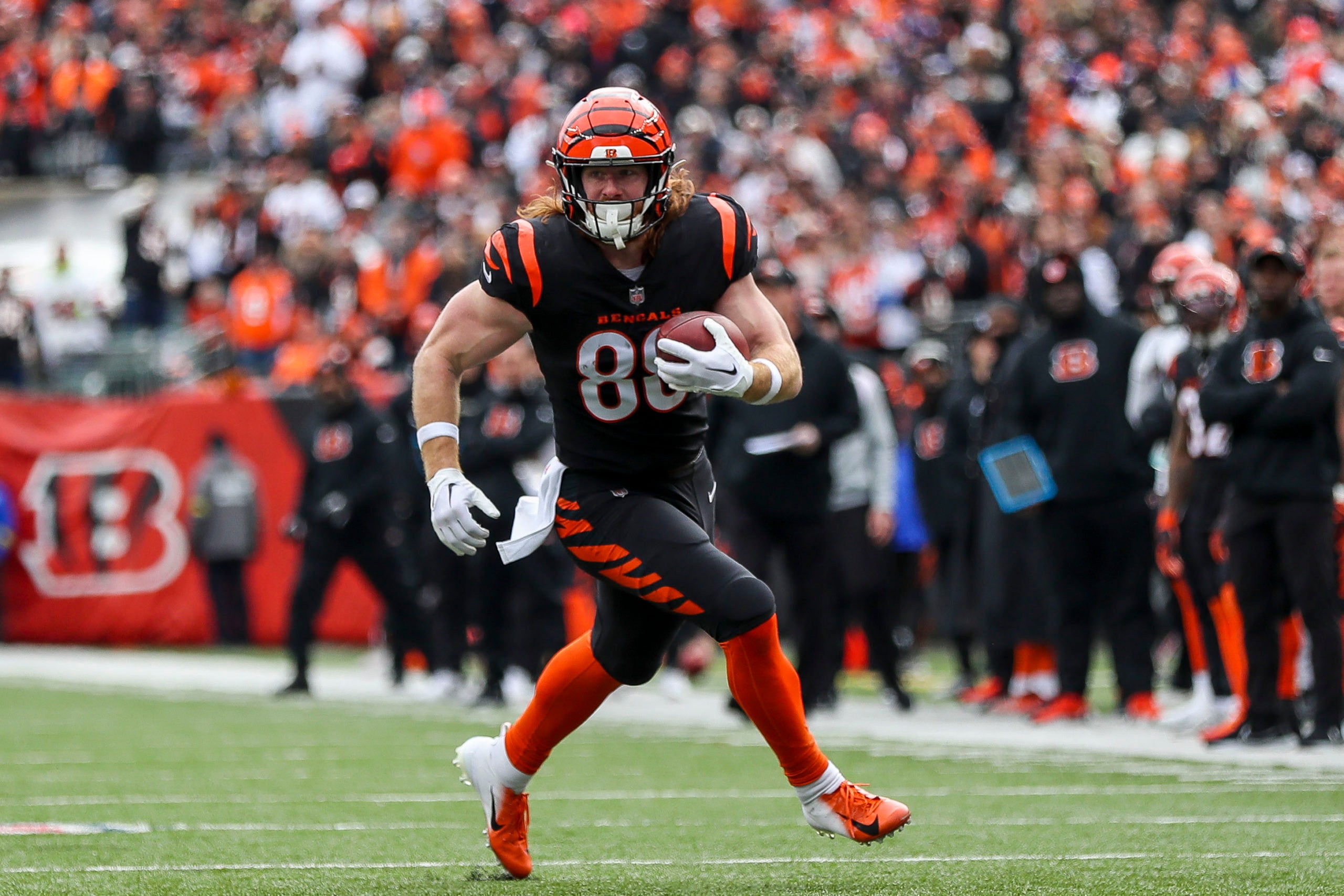 Jan 8, 2023; Cincinnati, Ohio, USA; Cincinnati Bengals tight end Hayden Hurst (88) runs with the ball against the Baltimore Ravens in the first half at Paycor Stadium. Mandatory Credit: Katie Stratman-USA TODAY Sports