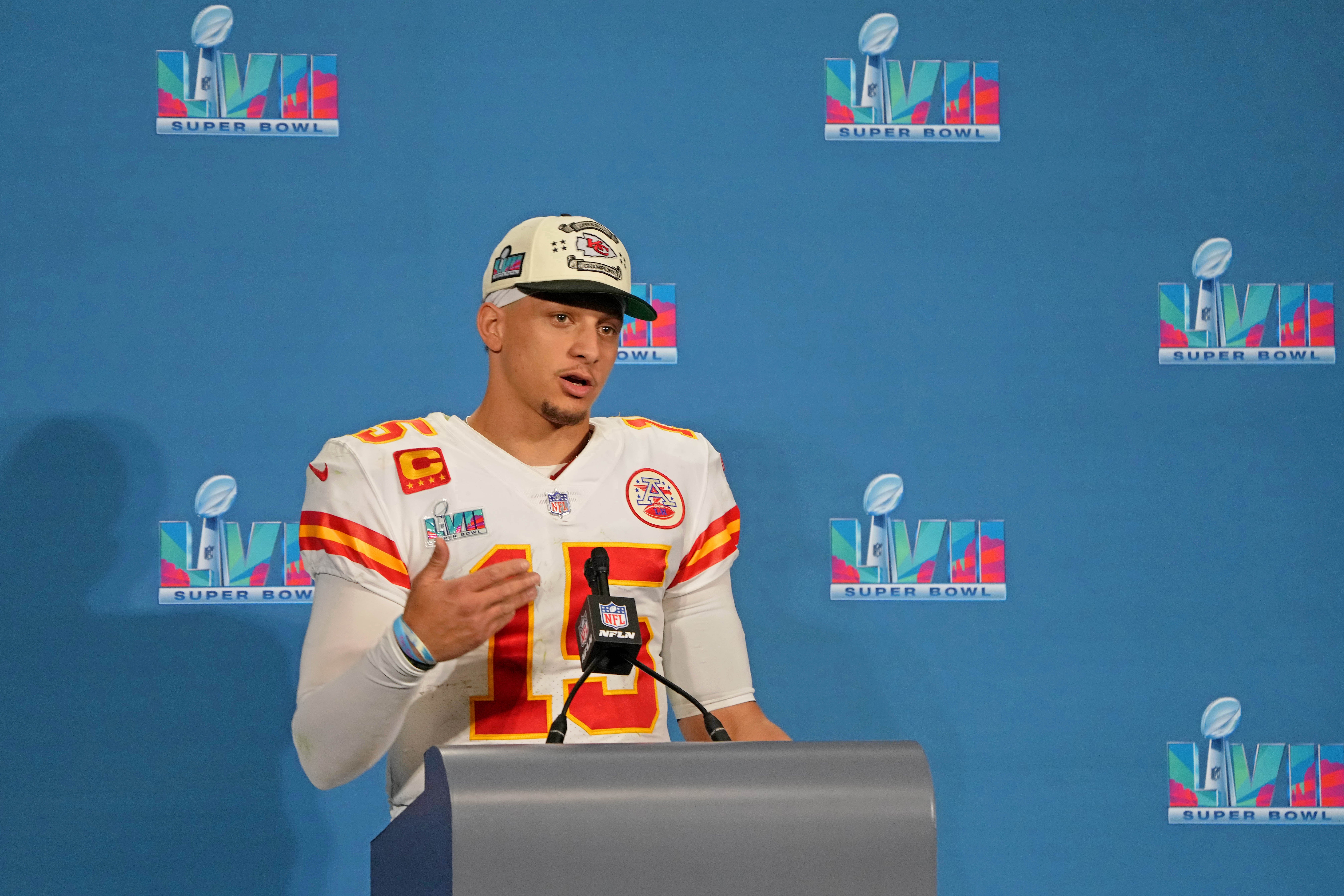 Feb 12, 2023; Glendale, Arizona, US; Kansas City Chiefs quarterback Patrick Mahomes (15) talks to the media during a press conference after winning Super Bowl LVII against the Philadelphia Eagles at State Farm Stadium. Mandatory Credit: Kirby Lee-USA TODAY Sports