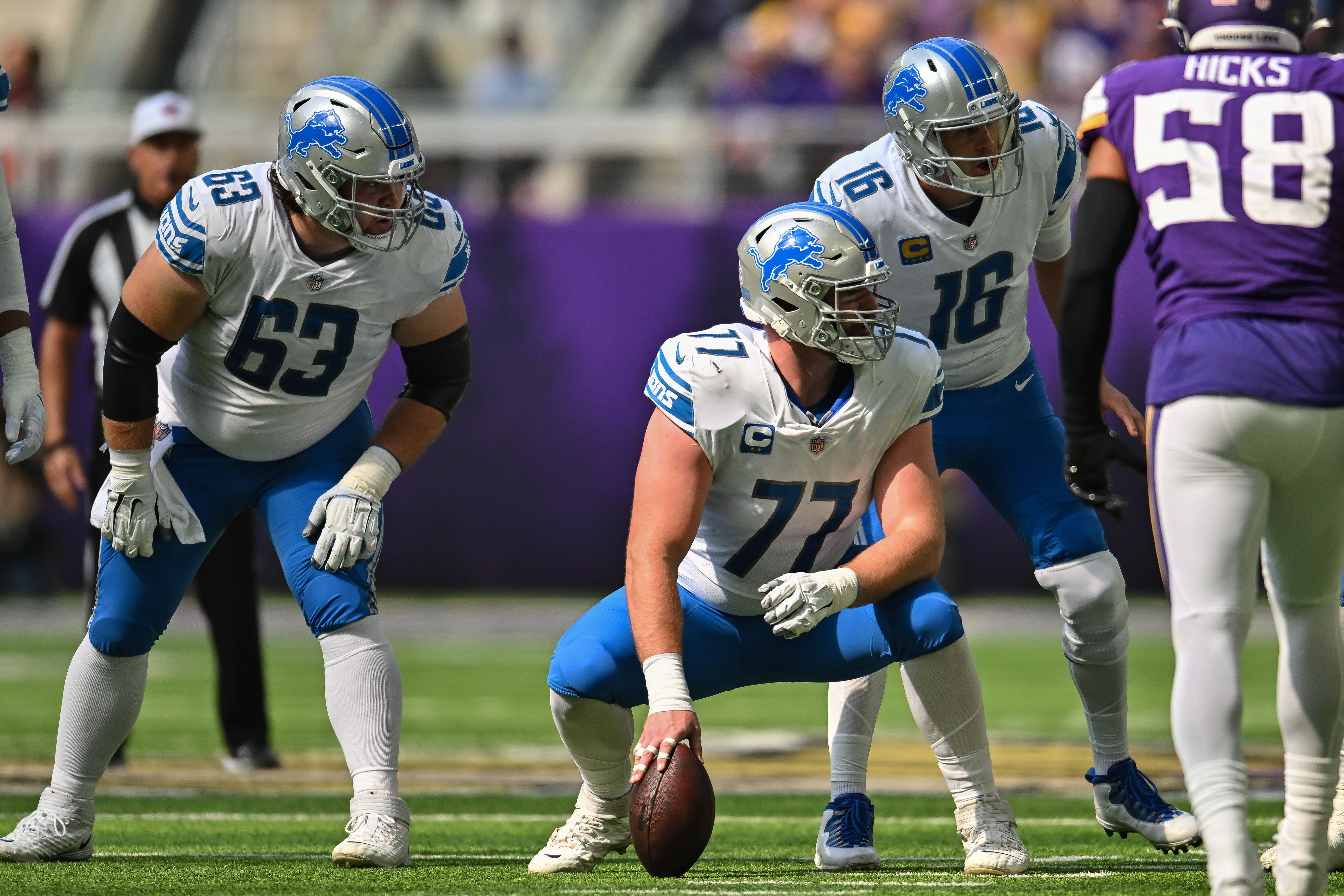 Sep 25, 2022; Minneapolis, Minnesota, USA; Detroit Lions quarterback Jared Goff (16) and center Evan Brown (63) and center Frank Ragnow (77) in action during the game against the Minnesota Vikings at U.S. Bank Stadium. Mandatory Credit: Jeffrey Becker-USA TODAY Sports