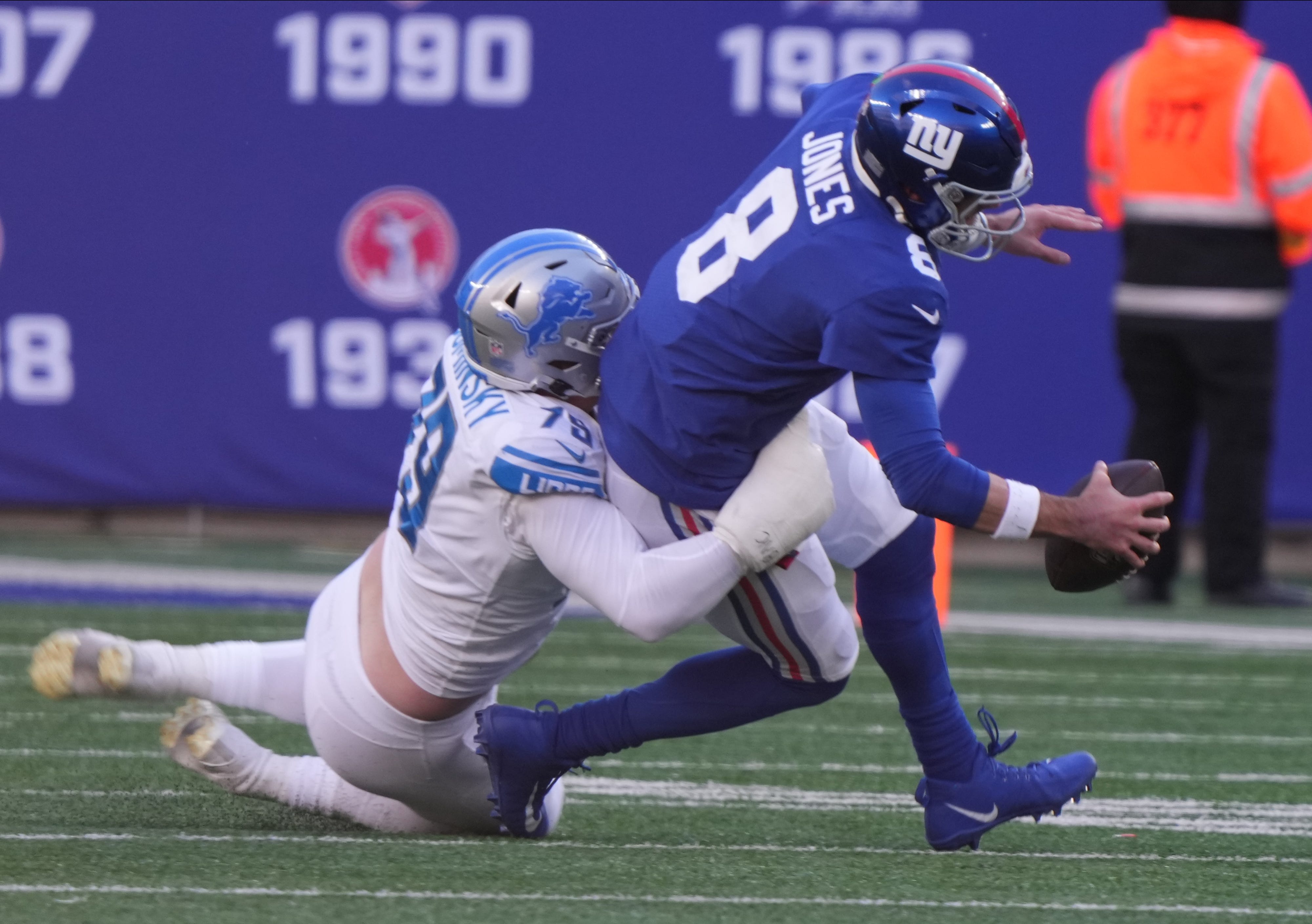 Detroit Lions pass rush defense re-sign John Cominsky free agency draft NFL football stats news
