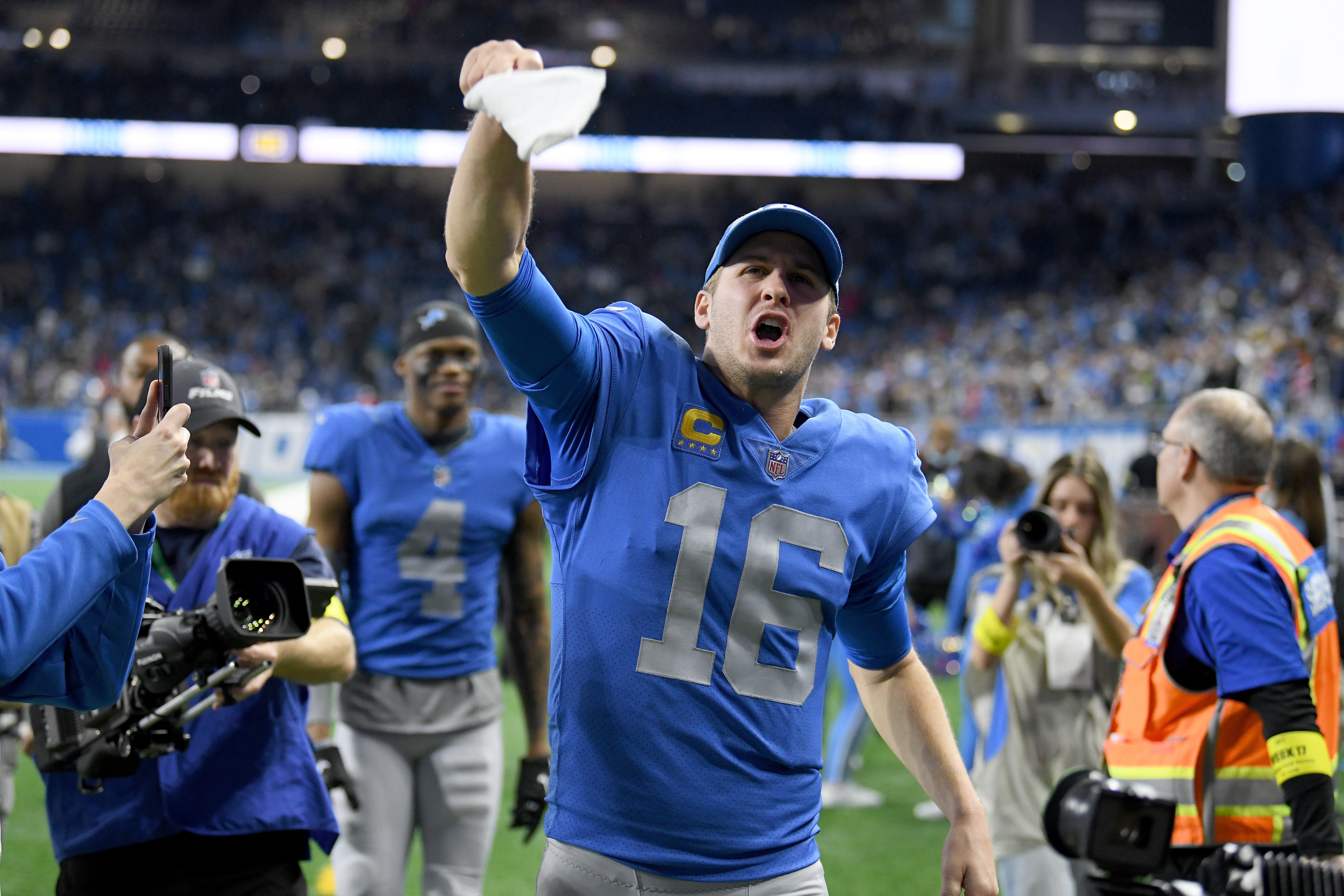 Jan 1, 2023; Detroit, Michigan, USA; Detroit Lions quarterback Jared Goff pumps up the crowd as he walks off the field following their win over the Chicago Bears at Ford Field. Mandatory Credit: Lon Horwedel-USA TODAY Sports
