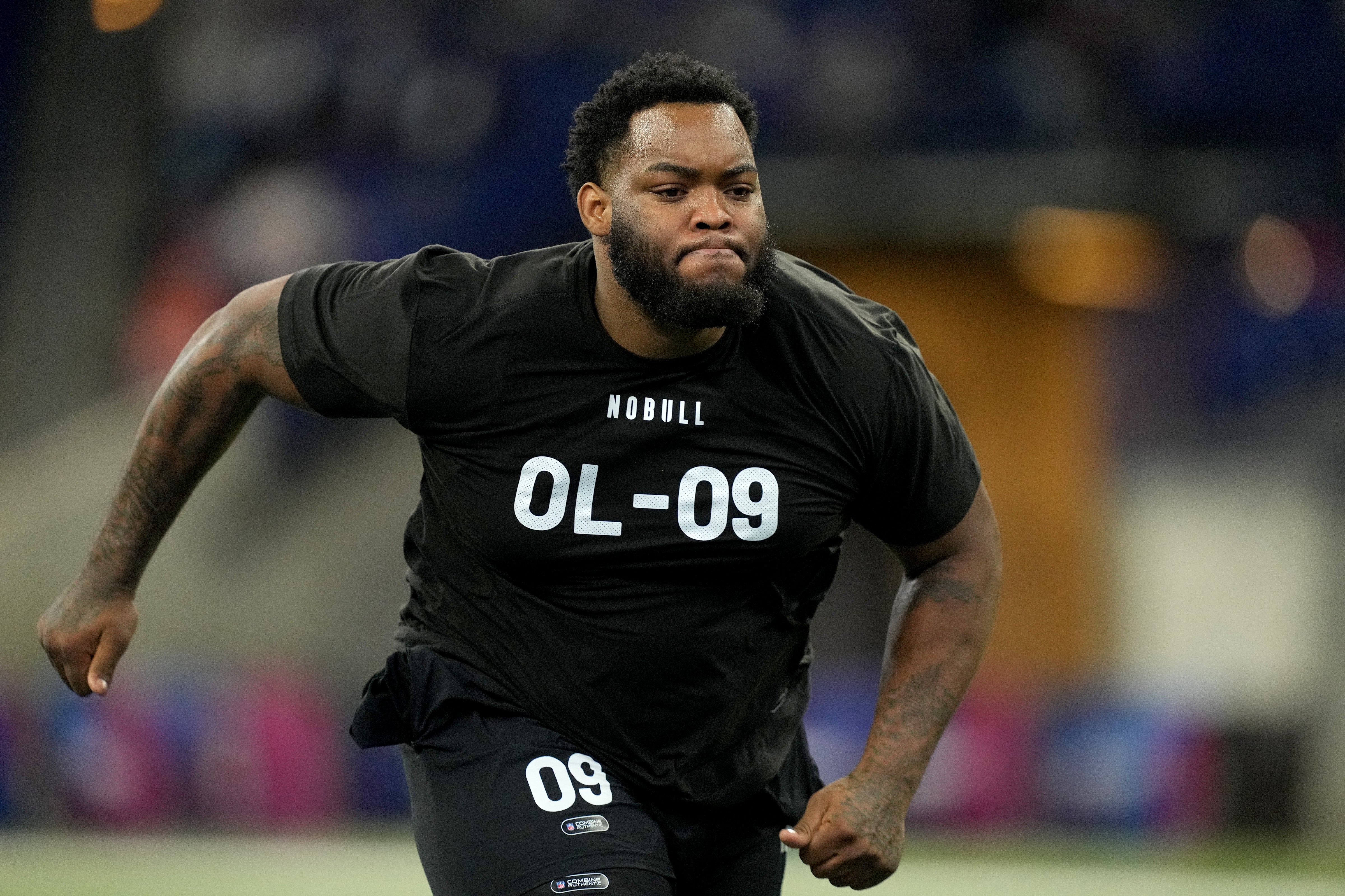 Mar 5, 2023; Indianapolis, IN, USA; Louisiana State offensive lineman Anthony Bradford (OL09) during the NFL Scouting Combine at Lucas Oil Stadium.