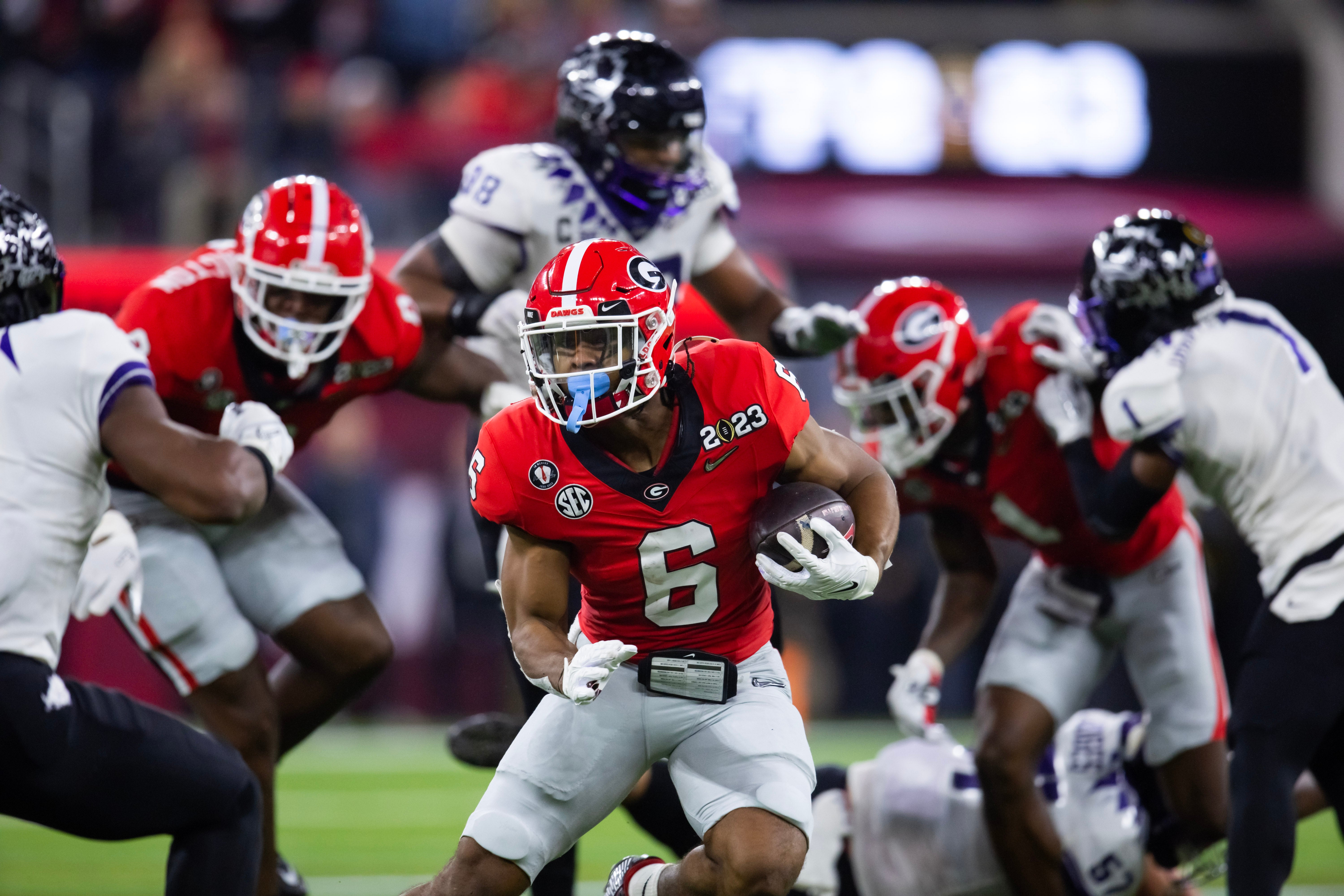 Jan 9, 2023; Inglewood, CA, USA; Georgia Bulldogs running back Kenny McIntosh (6) against the TCU Horned Frogs during the CFP national championship game at SoFi Stadium.