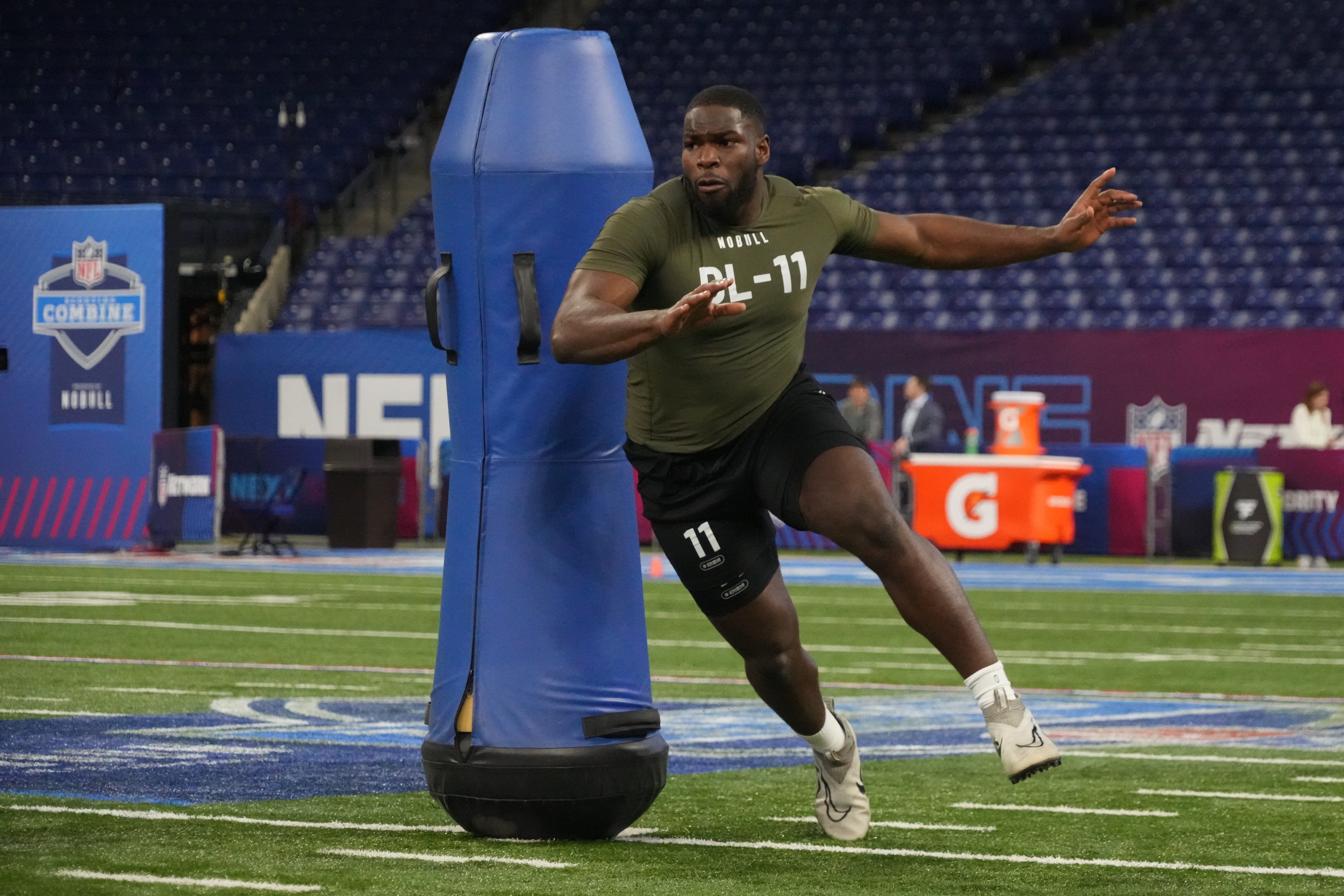 Mar 2, 2023; Indianapolis, IN, USA; Texas defensive lineman Moro Ojomo (DL11) participates in the NFL Combine at Lucas Oil Stadium. Mandatory Credit: Kirby Lee-USA TODAY Sports