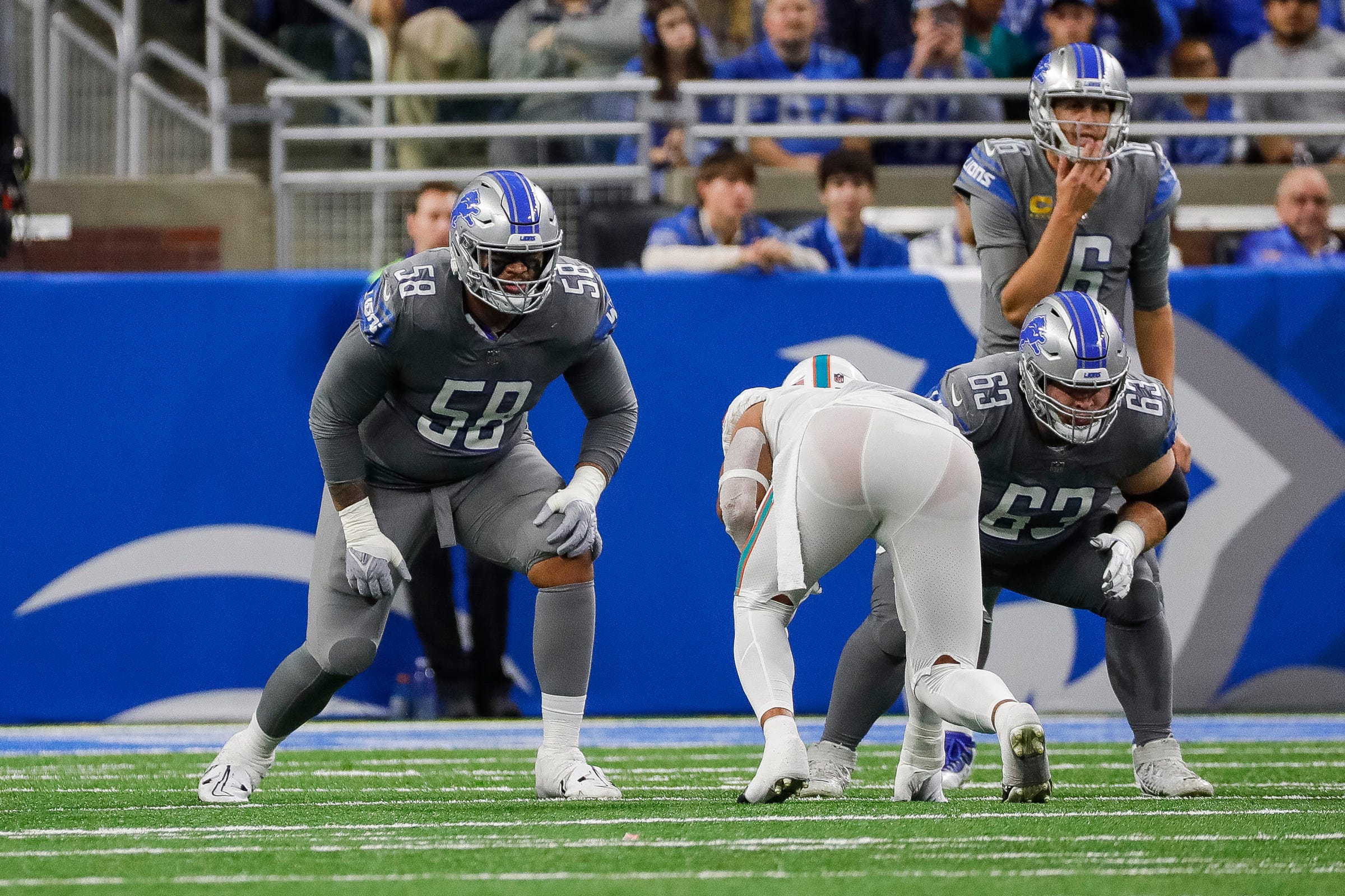 Detroit Lions offensive tackle Penei Sewell (58) gets ready for a snap against the Miami Dolphins during the second half at Ford Field in Detroit on Sunday, Oct. 30, 2022.