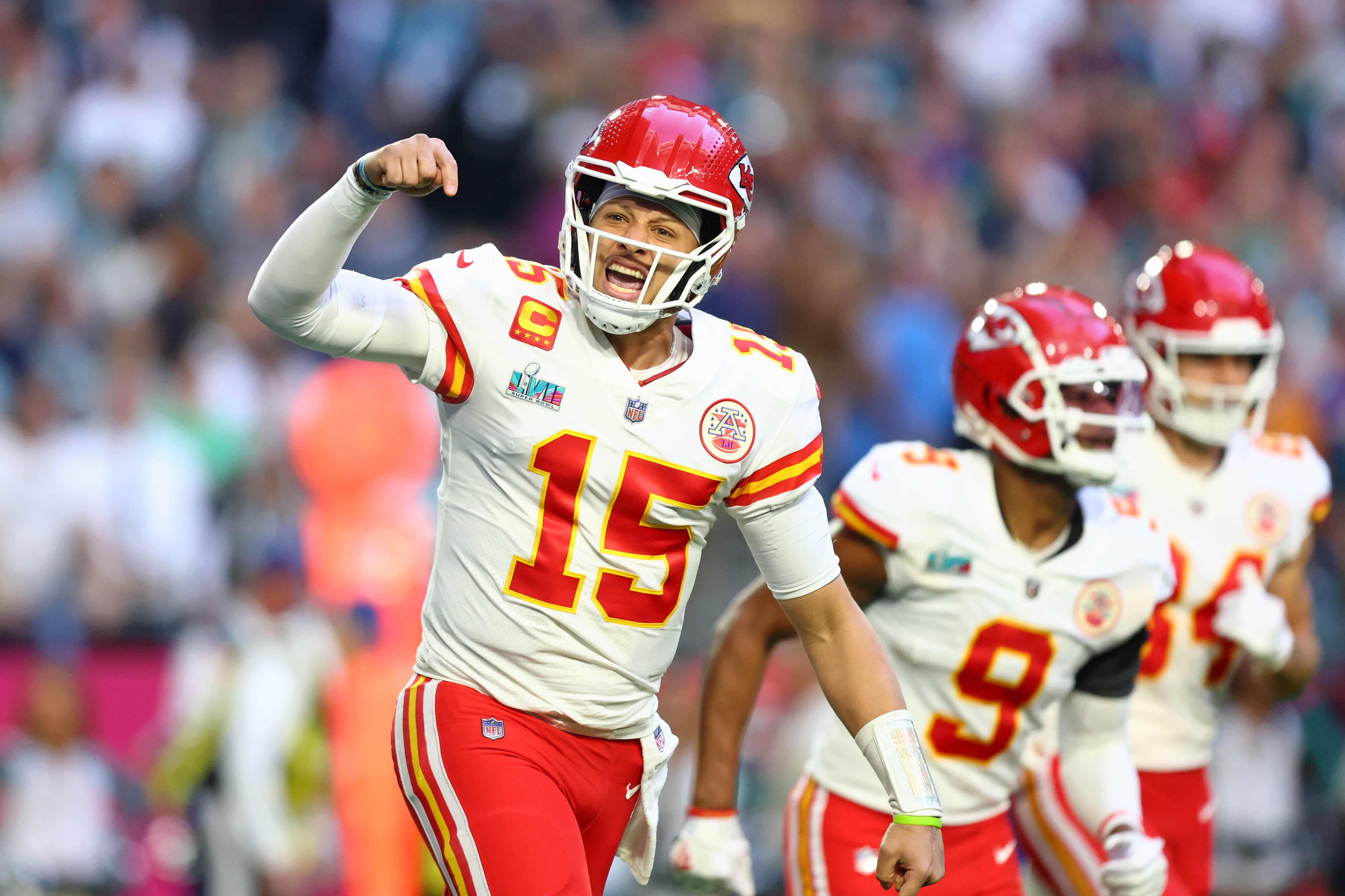 Feb 12, 2023; Glendale, Arizona, US; Kansas City Chiefs quarterback Patrick Mahomes (15) reacts after a touchdown against the Philadelphia Eagles during the first quarter of Super Bowl LVII at State Farm Stadium.