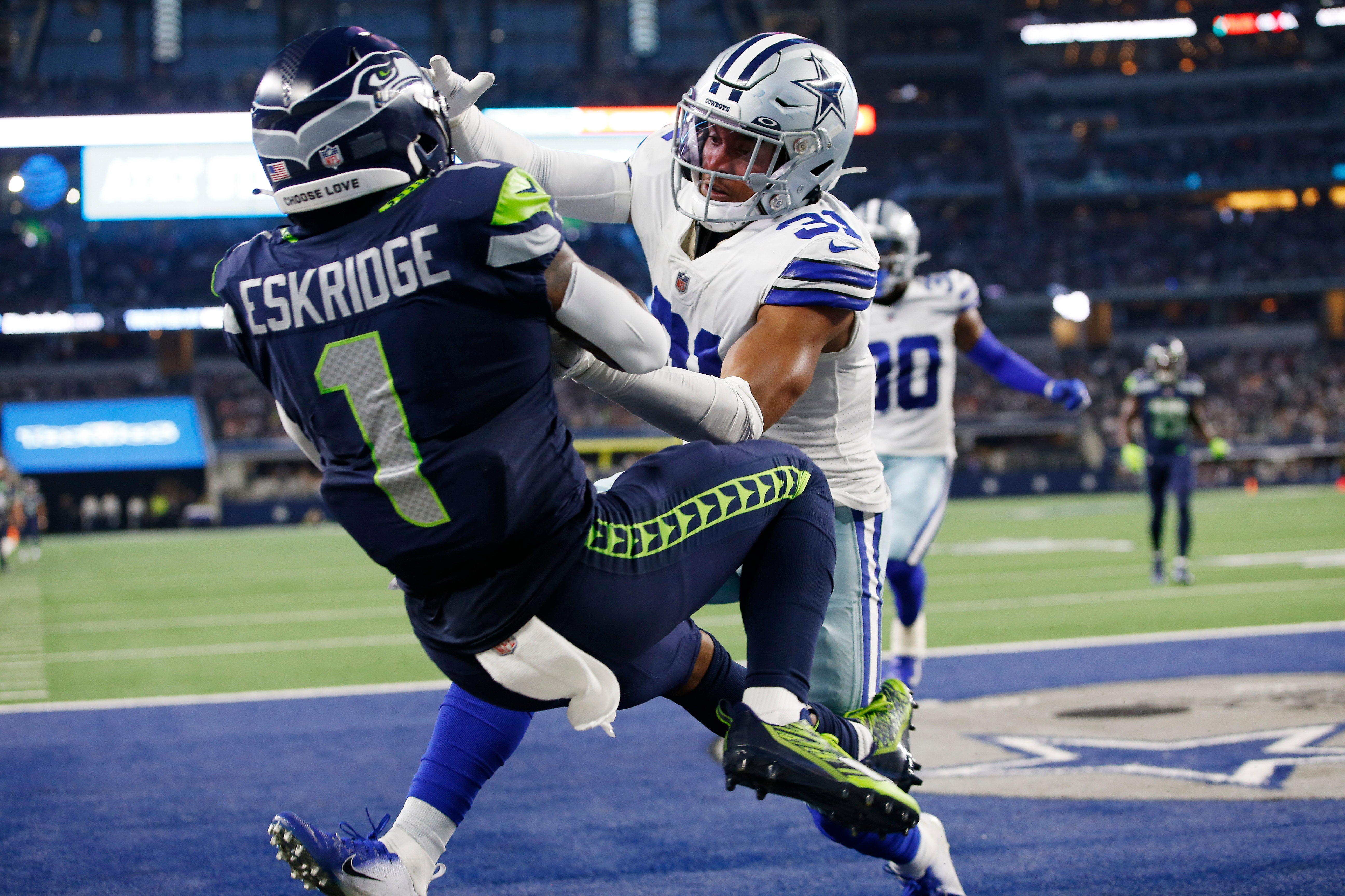 Aug 26, 2022; Arlington, Texas, USA; Seattle Seahawks wide receiver Dee Eskridge (1) cannot catch a pass while defended by Dallas Cowboys safety Tyler Coyle (31) in the second quarter at AT&T Stadium.