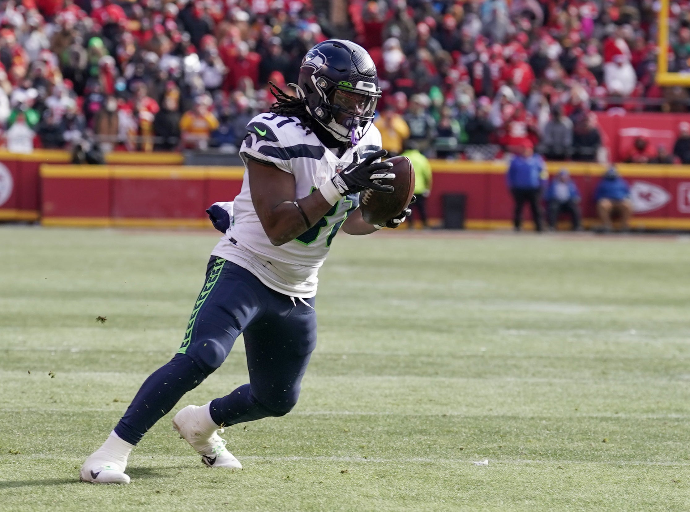 Dec 24, 2022; Kansas City, Missouri, USA; Seattle Seahawks running back DeeJay Dallas (31) catches a pass against the Kansas City Chiefs during the first half at GEHA Field at Arrowhead Stadium.
