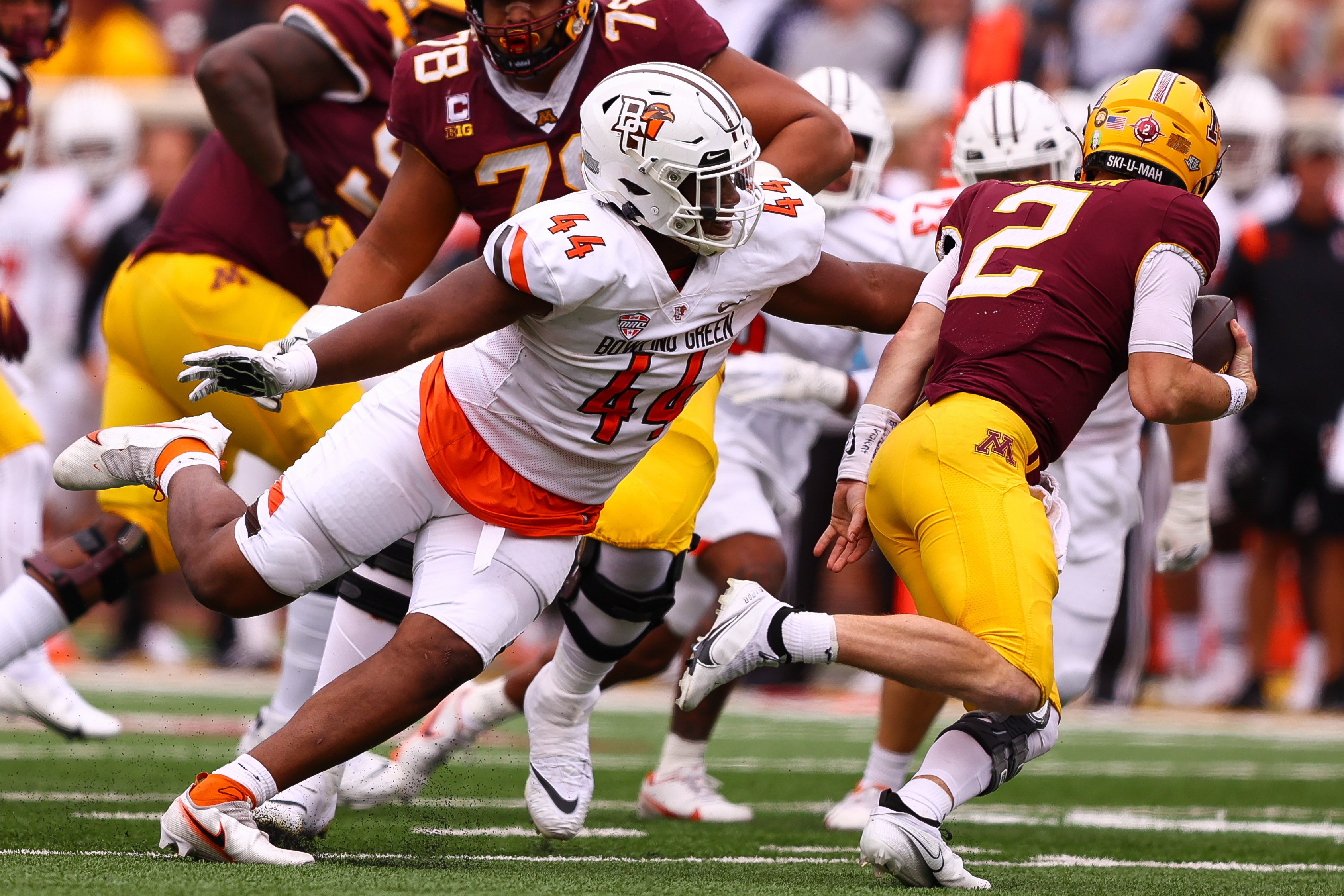 Sep 25, 2021; Minneapolis, Minnesota, USA; Bowling Green Falcons defensive lineman Karl Brooks (44) sacks Minnesota Gophers quarterback Tanner Morgan (2) during the second quarter at Huntington Bank Stadium.