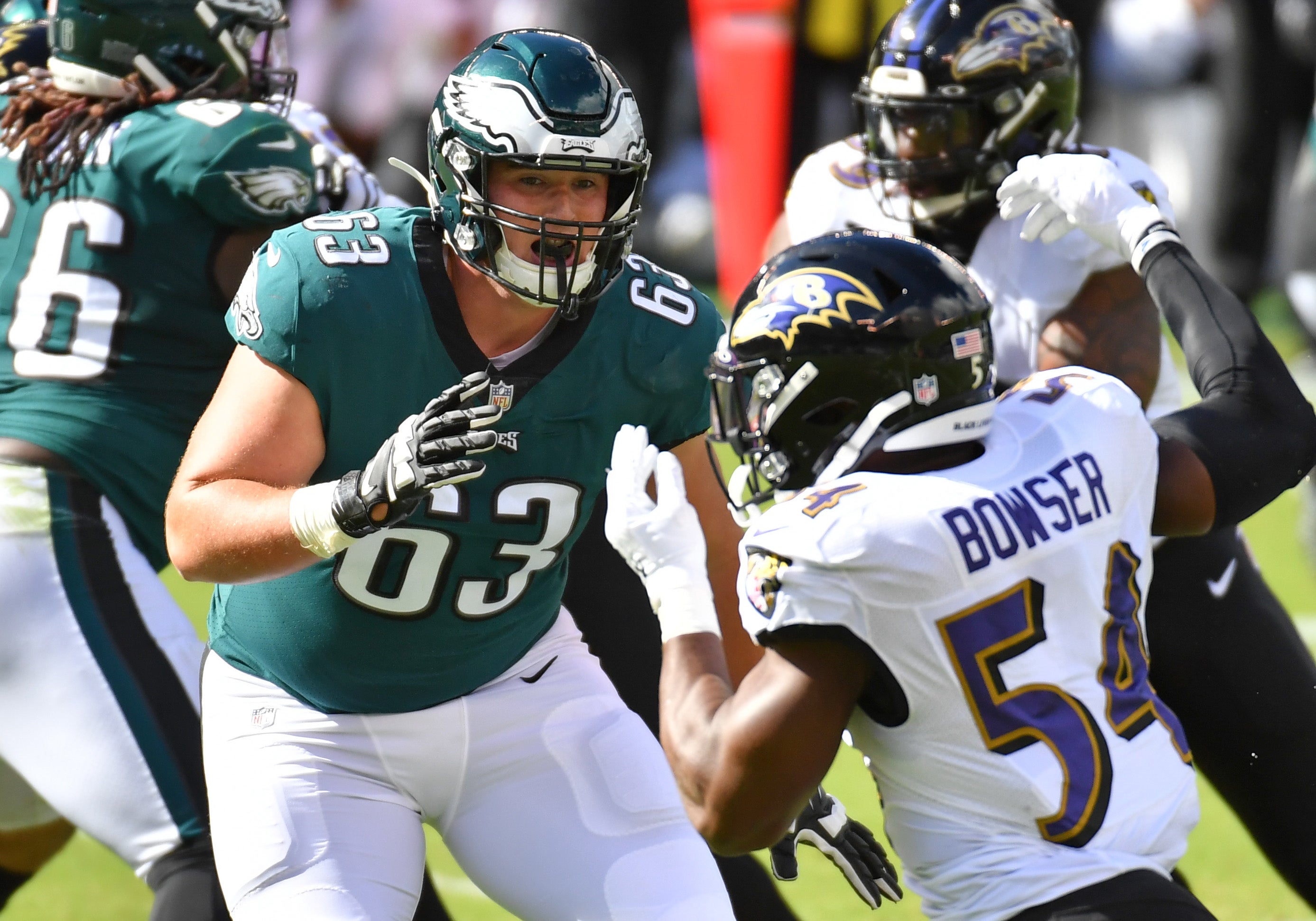 ct 18, 2020; Philadelphia, Pennsylvania, USA; Philadelphia Eagles offensive tackle Jack Driscoll (63) blocks Baltimore Ravens linebacker Tyus Bowser (54) during the second quarter at Lincoln Financial Field.