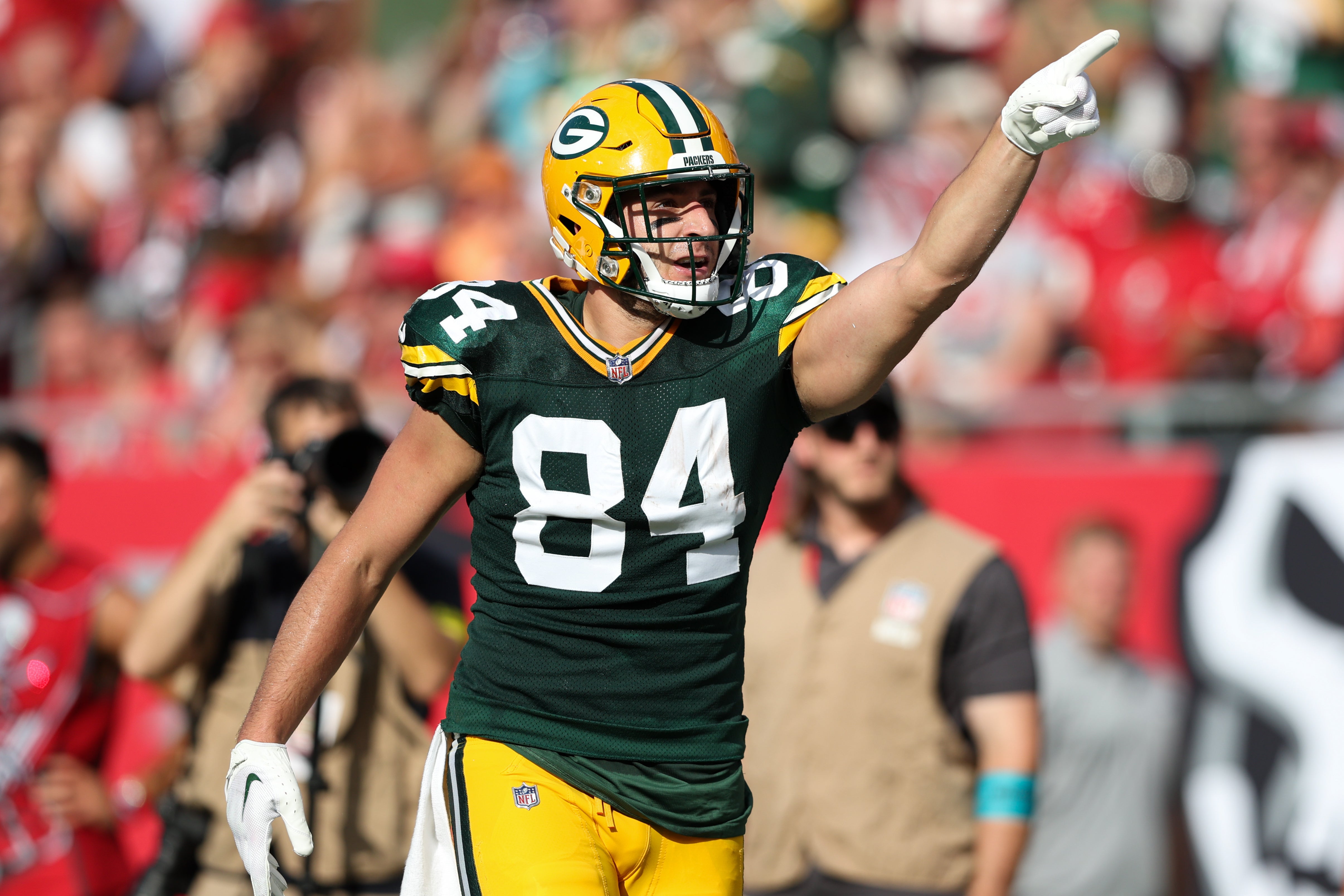 Sep 25, 2022; Tampa, Florida, USA; Green Bay Packers tight end Tyler Davis (84) signals for a first down against the Tampa Bay Buccaneers in the second quarter at Raymond James Stadium.