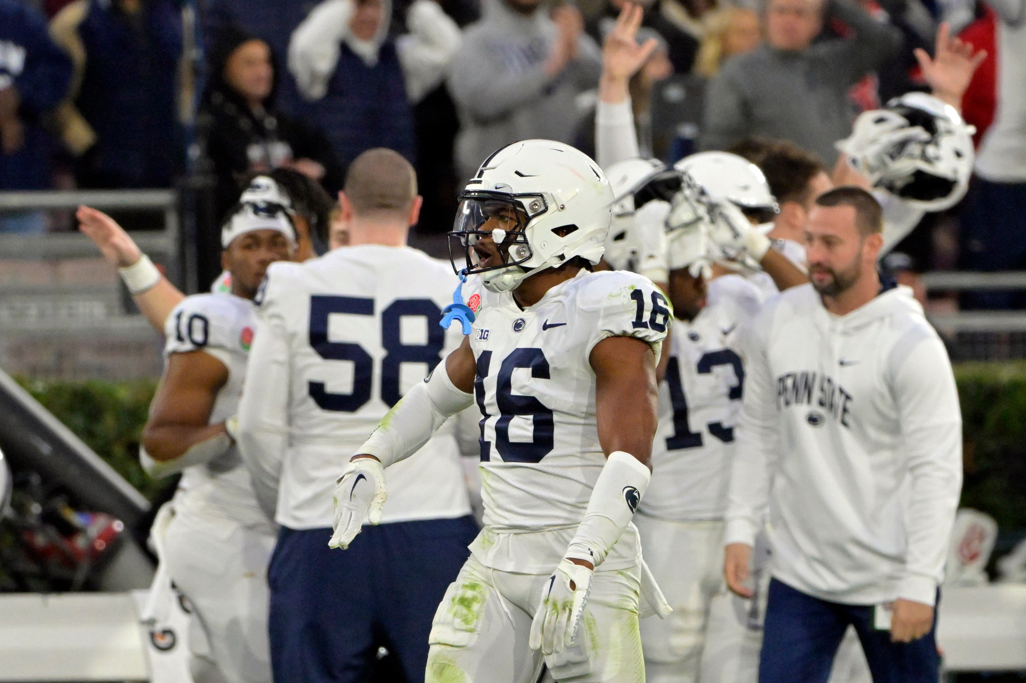 Jan 2, 2023; Pasadena, California, USA; Penn State Nittany Lions safety Ji'Ayir Brown (16) reacts after making an interception against the Utah Utes in the third quarter in the 109th Rose Bowl game at the Rose Bowl. Mandatory Credit: Jayne Kamin-Oncea-USA TODAY Sports