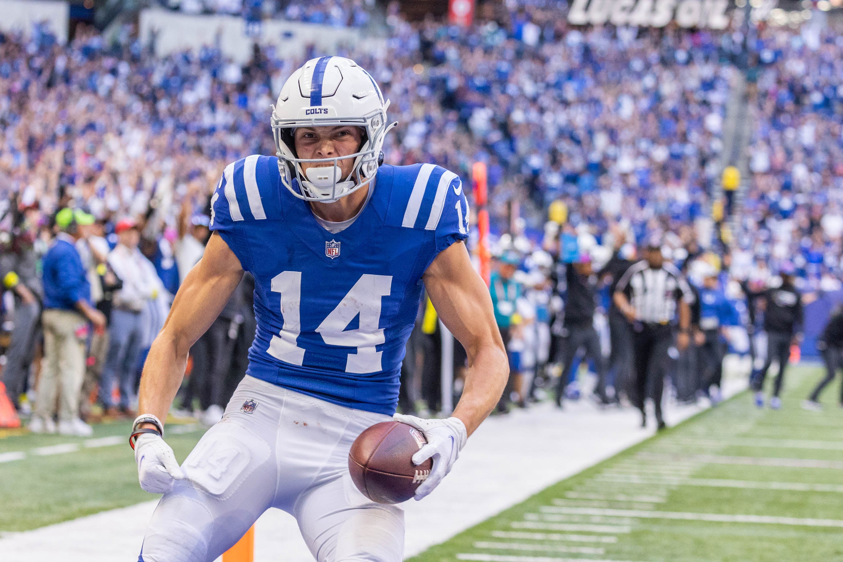 Oct 16, 2022; Indianapolis, Indiana, USA; Indianapolis Colts wide receiver Alec Pierce (14) celebrates his winning touchdown in the second half against the Jacksonville Jaguars at Lucas Oil Stadium.