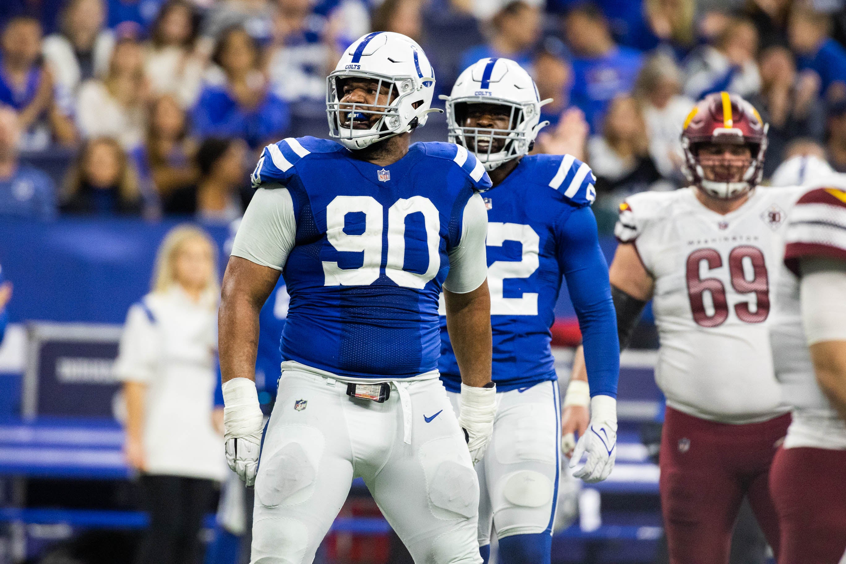 Oct 30, 2022; Indianapolis, Indiana, USA; Indianapolis Colts defensive tackle Grover Stewart (90) celebrates a tackle for a loss in the second quarter against the Washington Commanders at Lucas Oil Stadium.