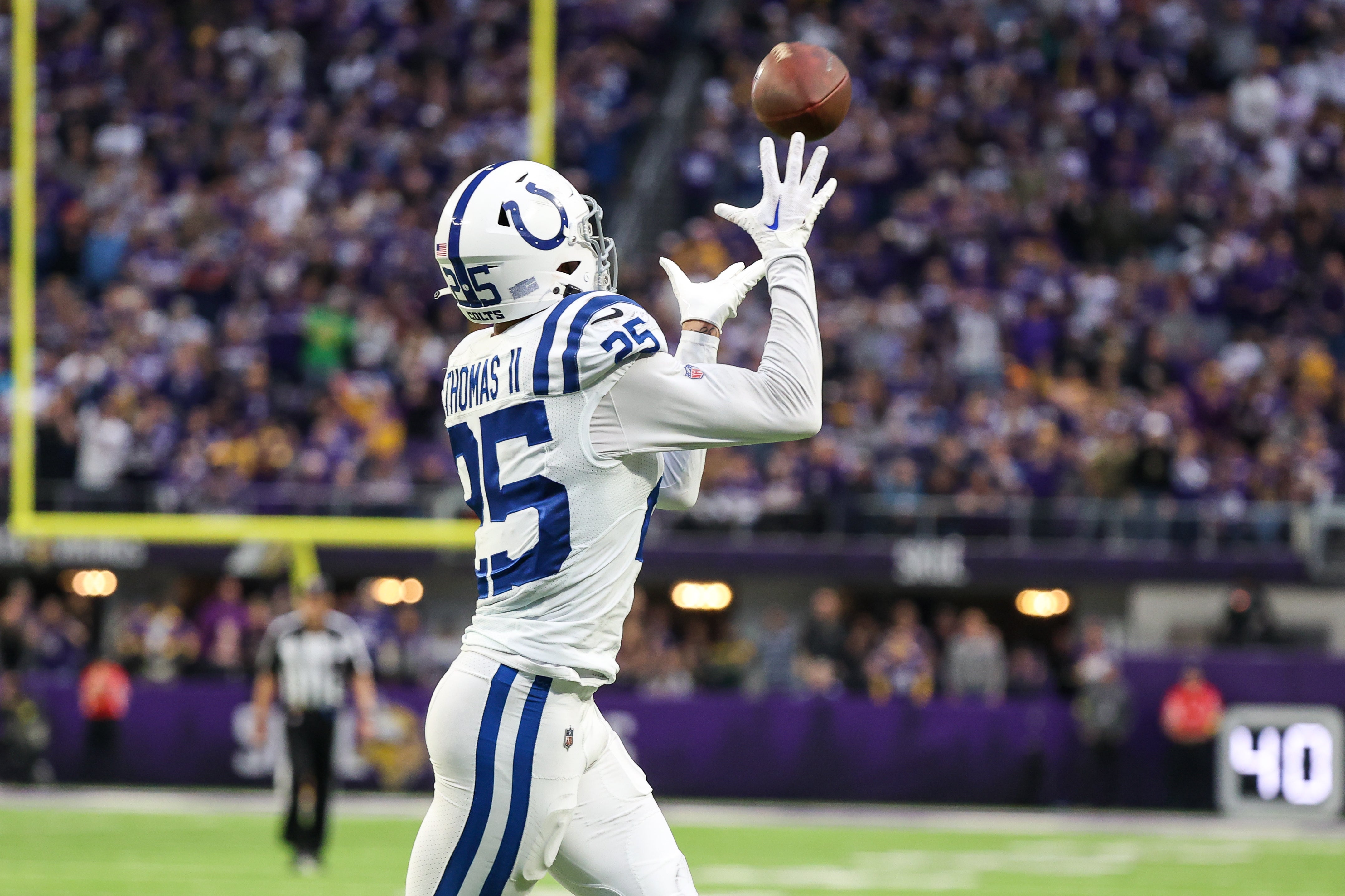 Dec 17, 2022; Minneapolis, Minnesota, USA; Indianapolis Colts safety Rodney Thomas II (25) intercepts a pass against the Minnesota Vikings during the fourth quarter at U.S. Bank Stadium.