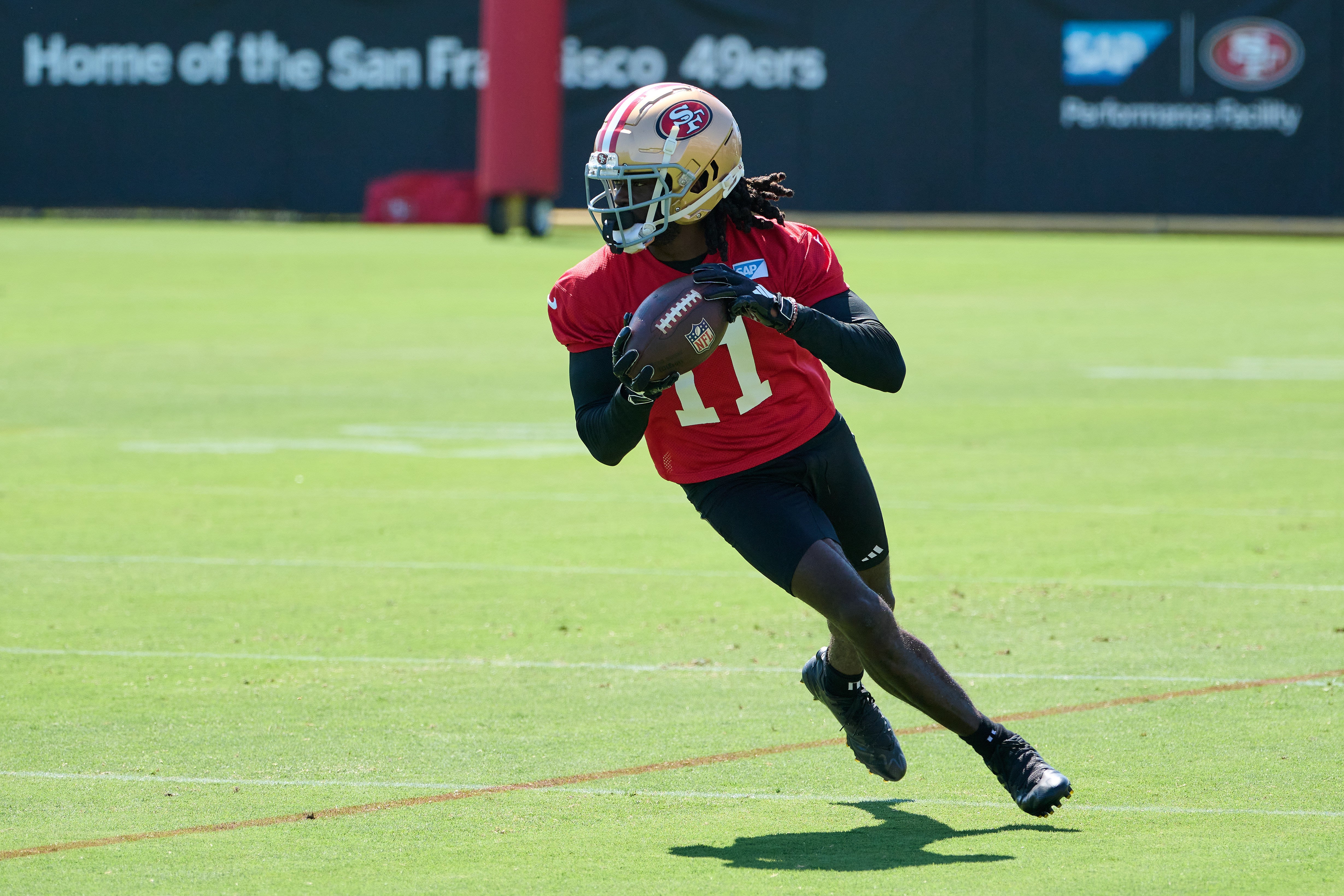 Jul 27, 2023; Santa Clara, CA, USA; San Francisco 49ers wide receiver Brandon Aiyuk (11) runs with the ball after a catch during training camp at the SAP Performance Facility. Mandatory Credit: Robert Edwards-USA TODAY Sports