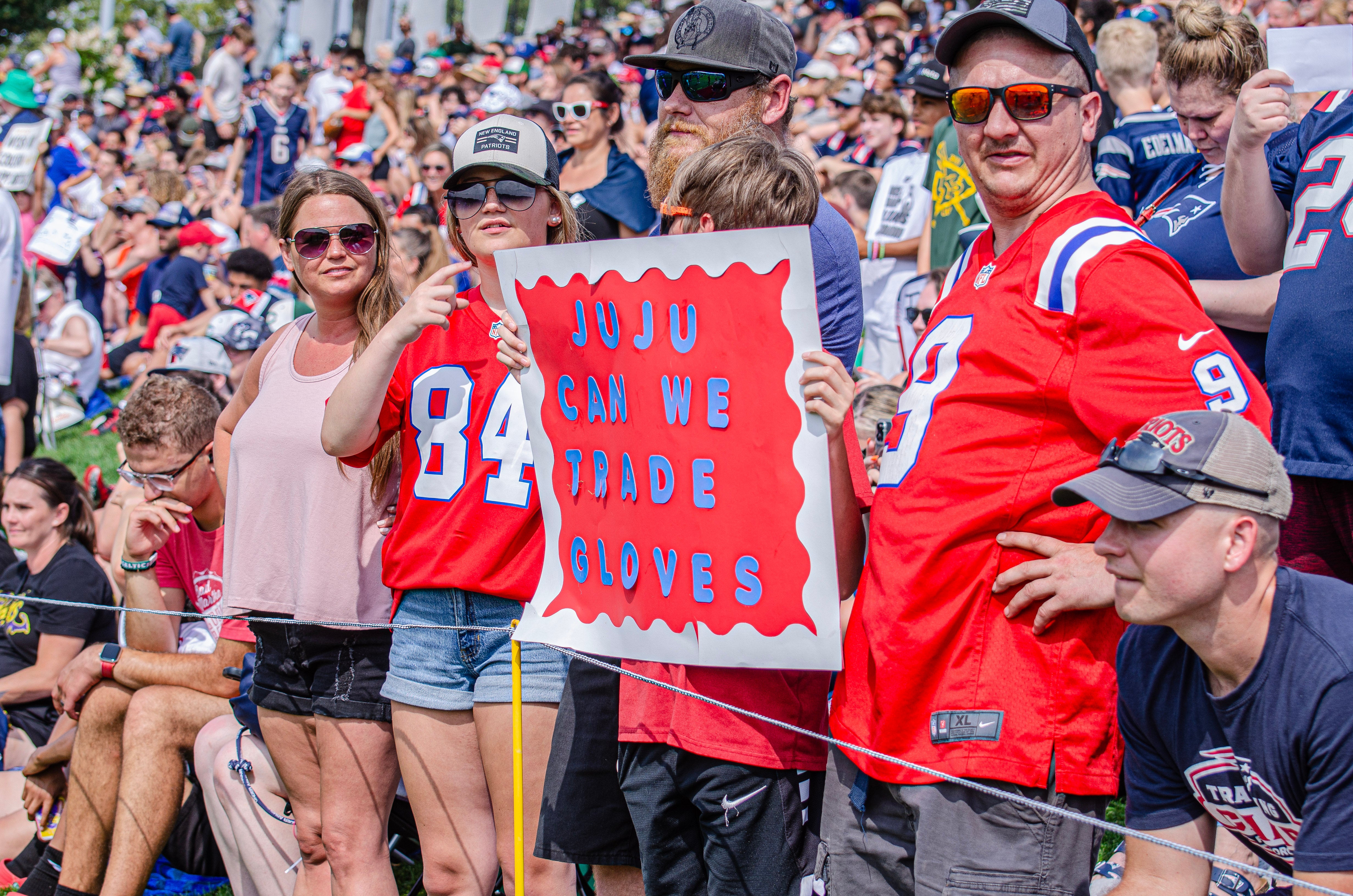 Patriots fans holding JuJu Smith-Schuster sign, Training Camp 2023
