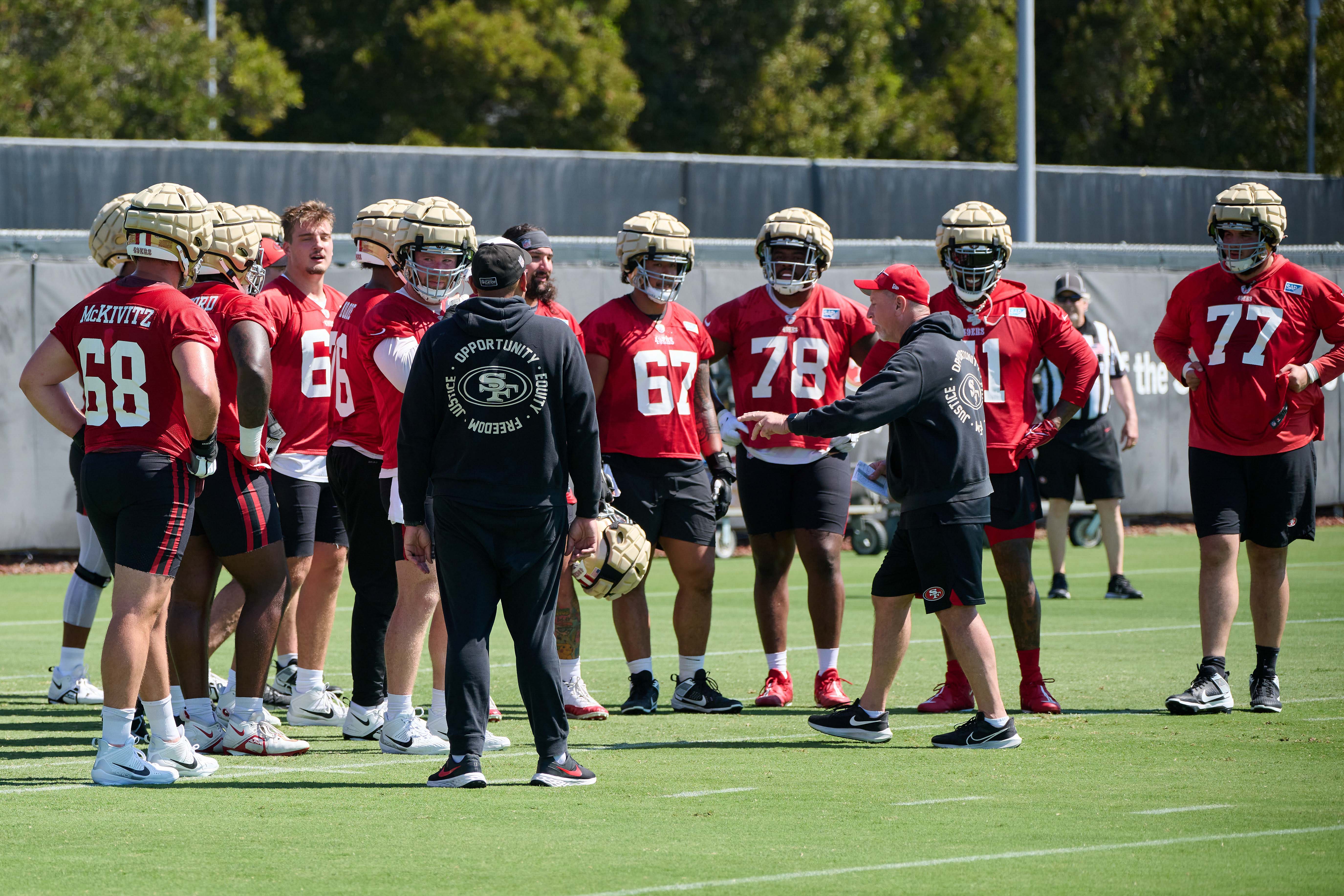 Jul 27, 2023; Santa Clara, CA, USA; San Francisco 49ers offensive line coach and run game coordinator Chris Foerster talks to a group of offensive lineman during training camp at the SAP Performance Facility. Mandatory Credit: Robert Edwards-USA TODAY Sports