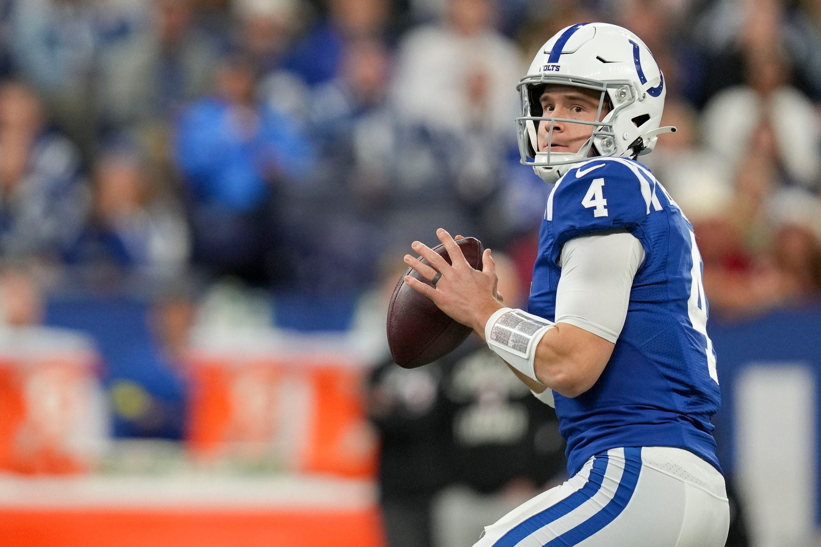 Indianapolis Colts quarterback Sam Ehlinger (4) looks to pass down field Sunday, Jan. 8, 2023, during a game against the Houston Texans at Lucas Oil Stadium in Indianapolis.