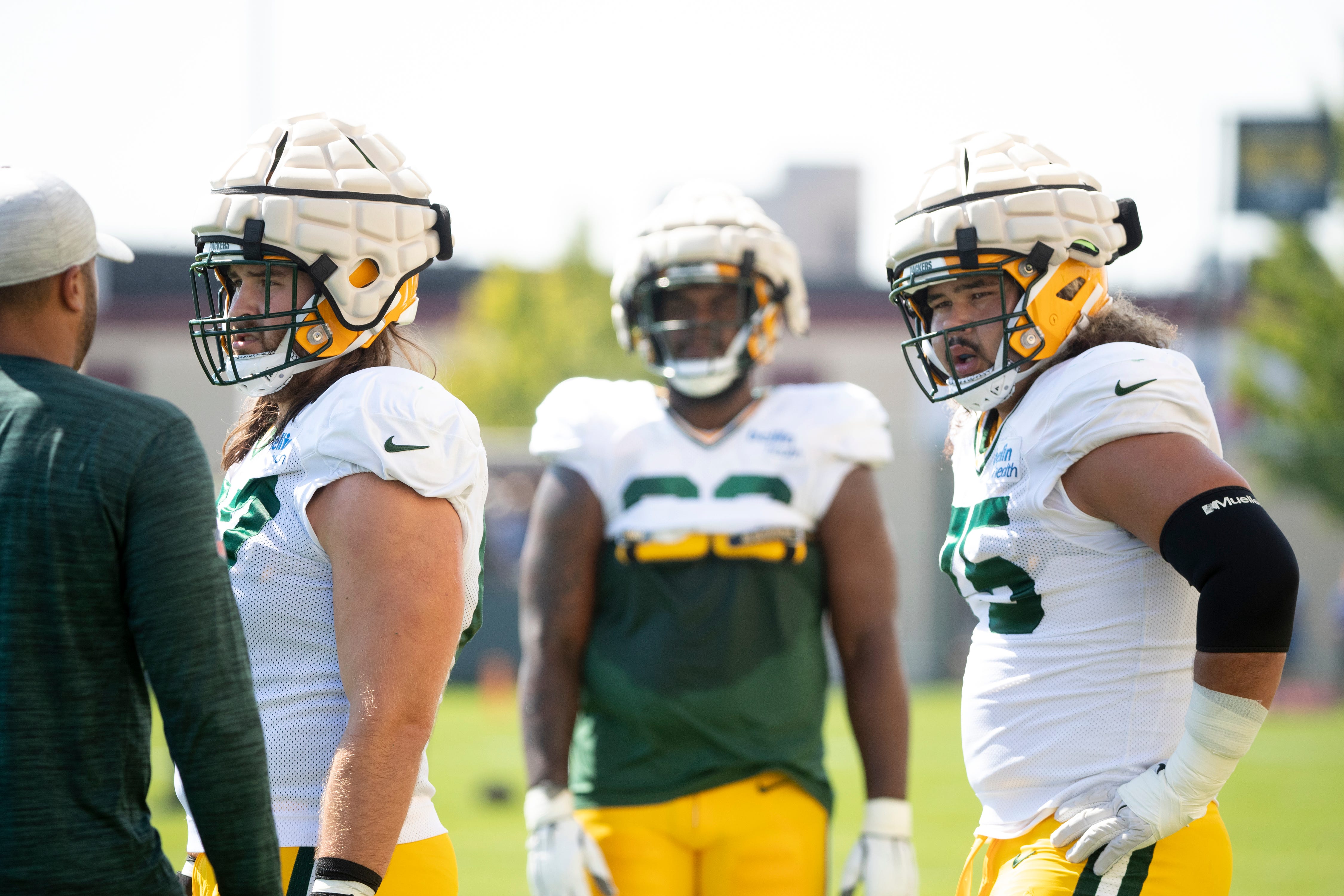 Green Bay Packers tackle/guard Royce Newman (70) and Sean Rhyan (75) participate at training camp practice on Tuesday, Aug. 16, 2022, at Ray Nitschke Field in Ashwaubenon, Wis.