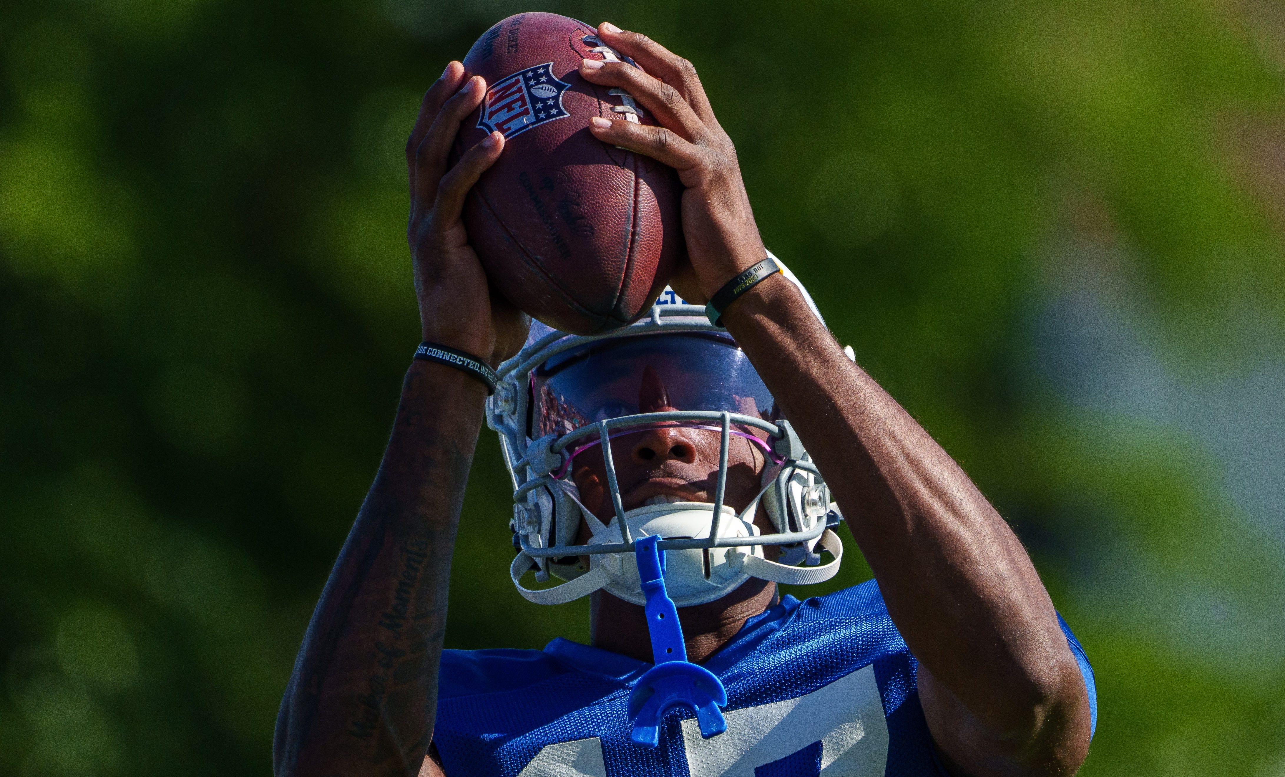 Indianapolis Colts wide receiver Mike Strachan (17) pulls in a pass Monday, July 31, 2023, during training camp at the Grand Park Sports Campus in Westfield, Indiana.
