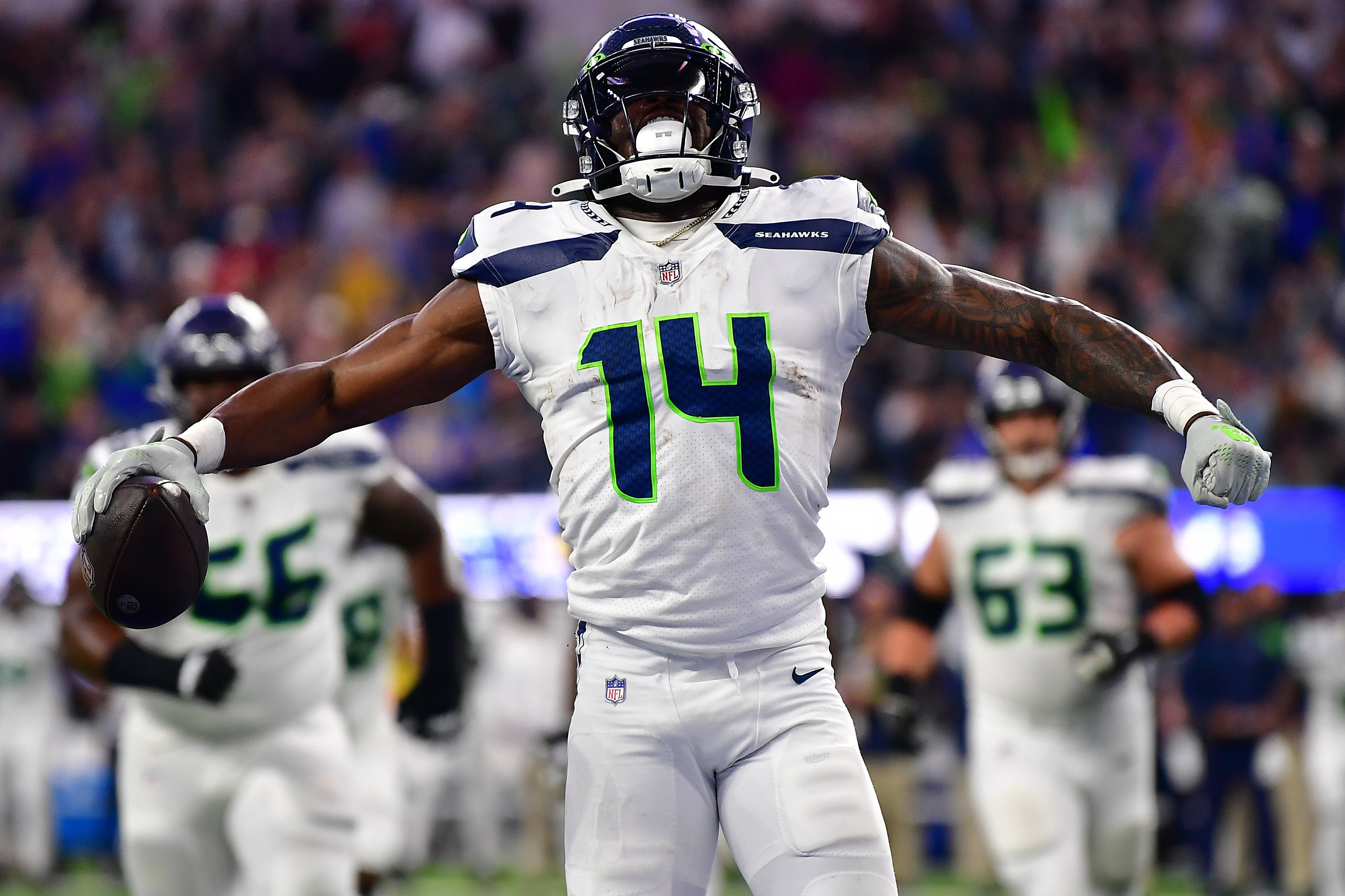 Dec 4, 2022; Inglewood, California, USA; Seattle Seahawks wide receiver DK Metcalf (14) celebrates his touchdown scored against the Los Angeles Rams during the second half at SoFi Stadium.