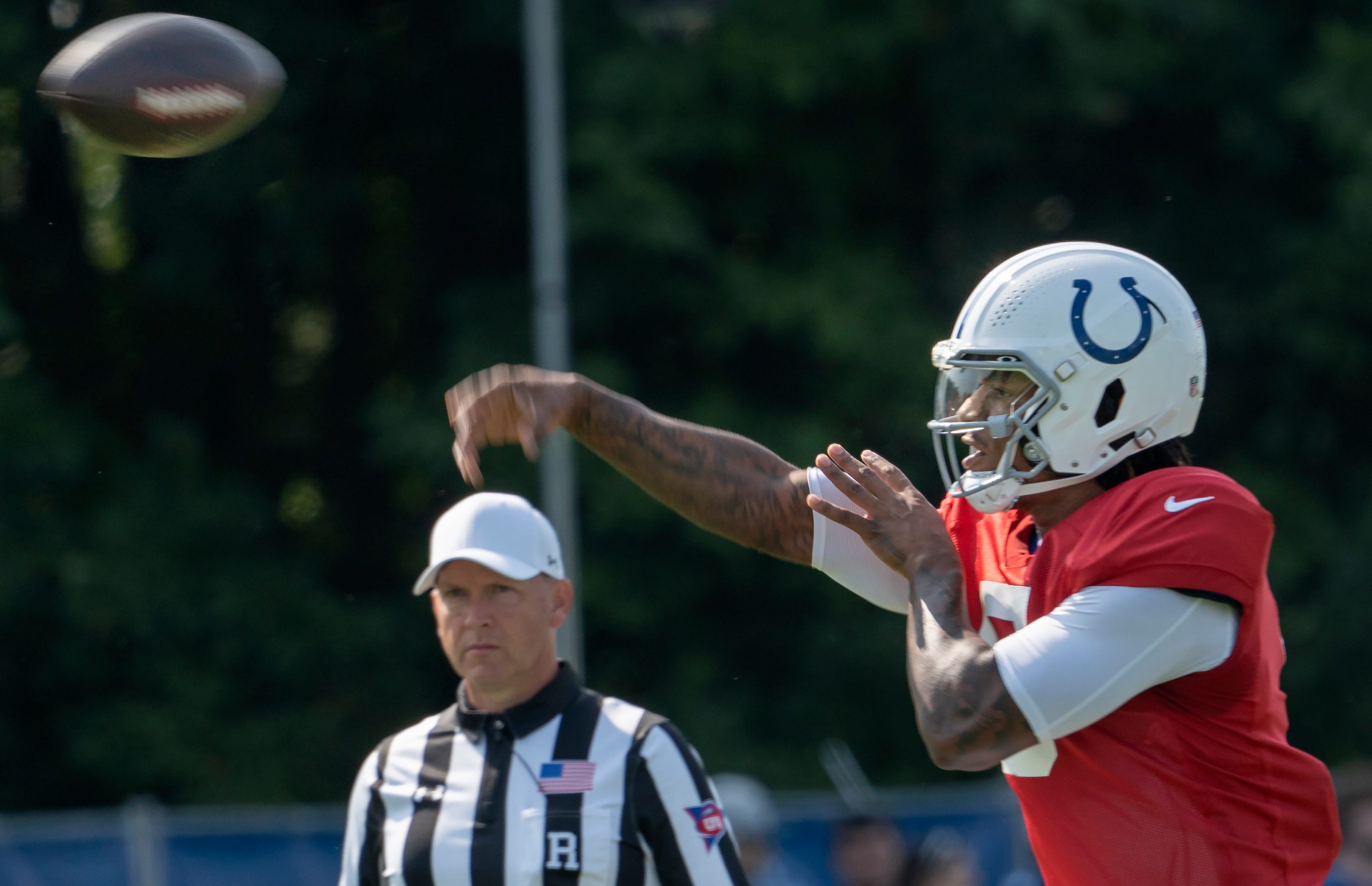 Indianapolis Colts quarterback Anthony Richardson (5) runs passing drills during Colts Camp practice at Grand Park, Tuesday, Aug. 1, 2023 in Westfield.