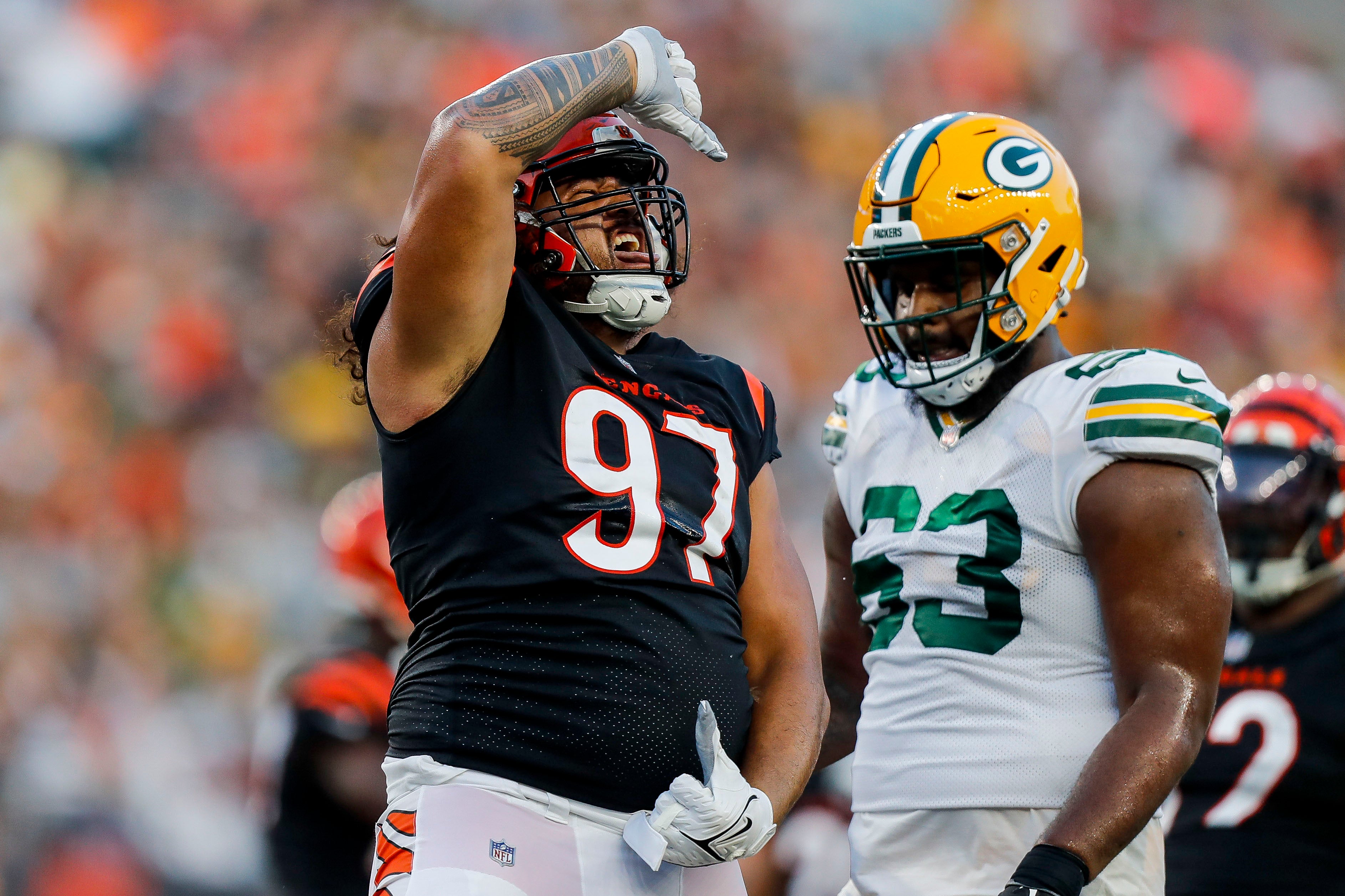 Aug 11, 2023; Cincinnati, Ohio, USA; Cincinnati Bengals defensive tackle Jay Tufele (97) reacts after a play against the Green Bay Packers in the first half at Paycor Stadium. Mandatory Credit: Katie Stratman-USA TODAY Sports