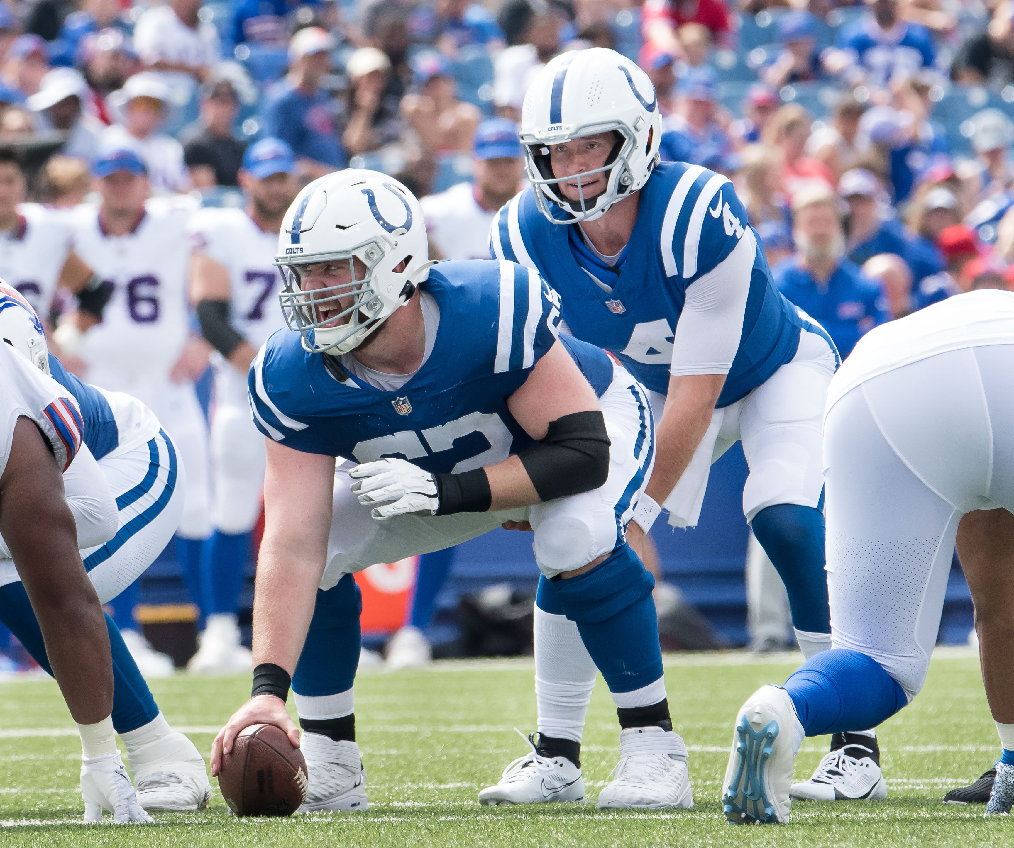 Aug 12, 2023; Orchard Park, New York, USA; Indianapolis Colts center Danny Pinter (63) and quarterback Sam Ehlinger (4) at the line of scrimmage in the fourth quarter of a pre-season game against the Buffalo Bills at Highmark Stadium.