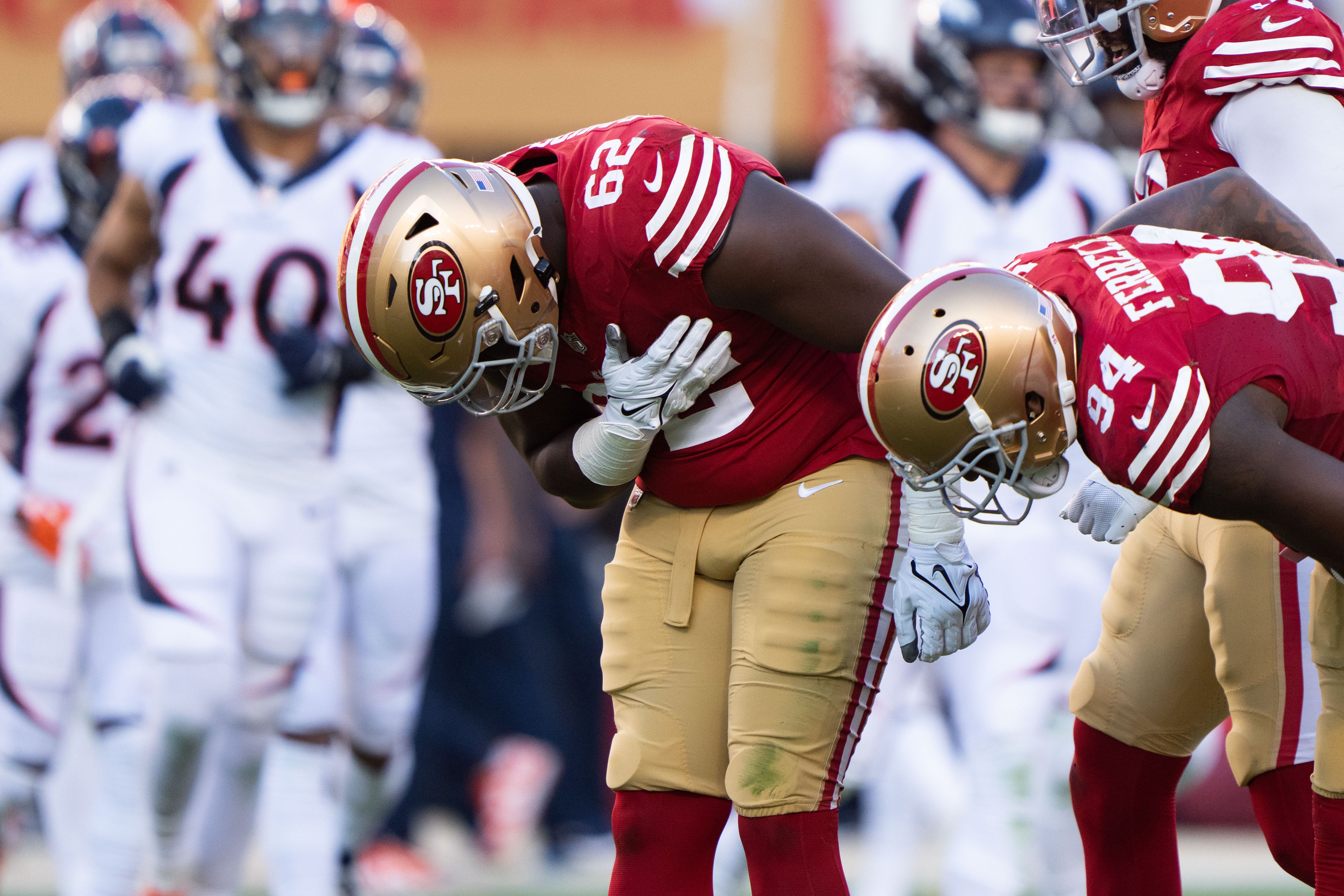 Aug 19, 2023; Santa Clara, California, USA; San Francisco 49ers defensive tackle Marlon Davidson (62) and defensive end Clelin Ferrell (94) bows after sacking Denver Broncos quarterback Jarrett Stidham (not pictured) during the second quarter at Levi's Stadium. Mandatory Credit: Stan Szeto-USA TODAY Sports