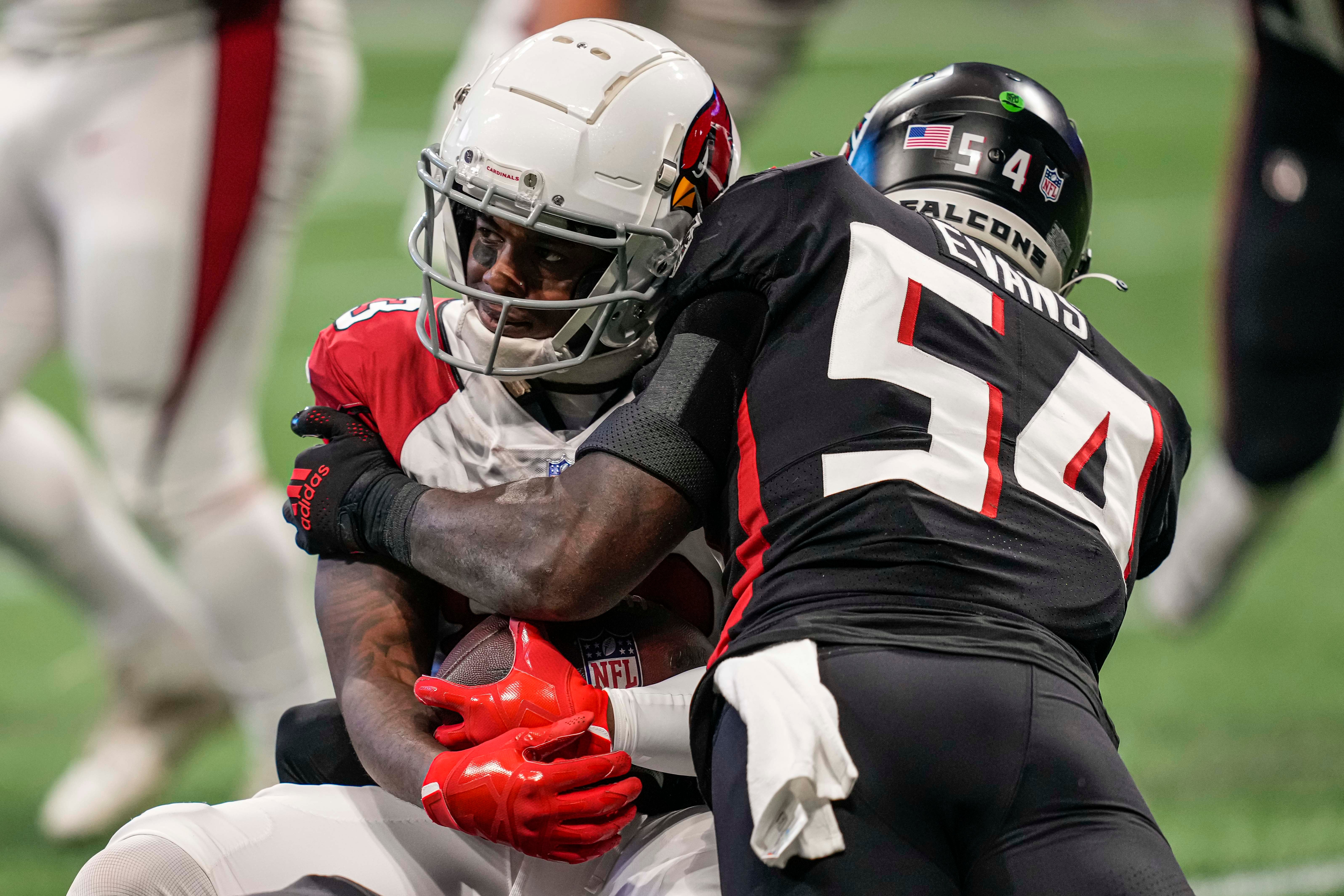 Arizona Cardinals wide receiver Greg Dortch (83) is tackled by Atlanta Falcons linebacker Rashaan Evans (54) during the second half at Mercedes-Benz Stadium. Mandatory Credit: Dale Zanine-USA TODAY Sports