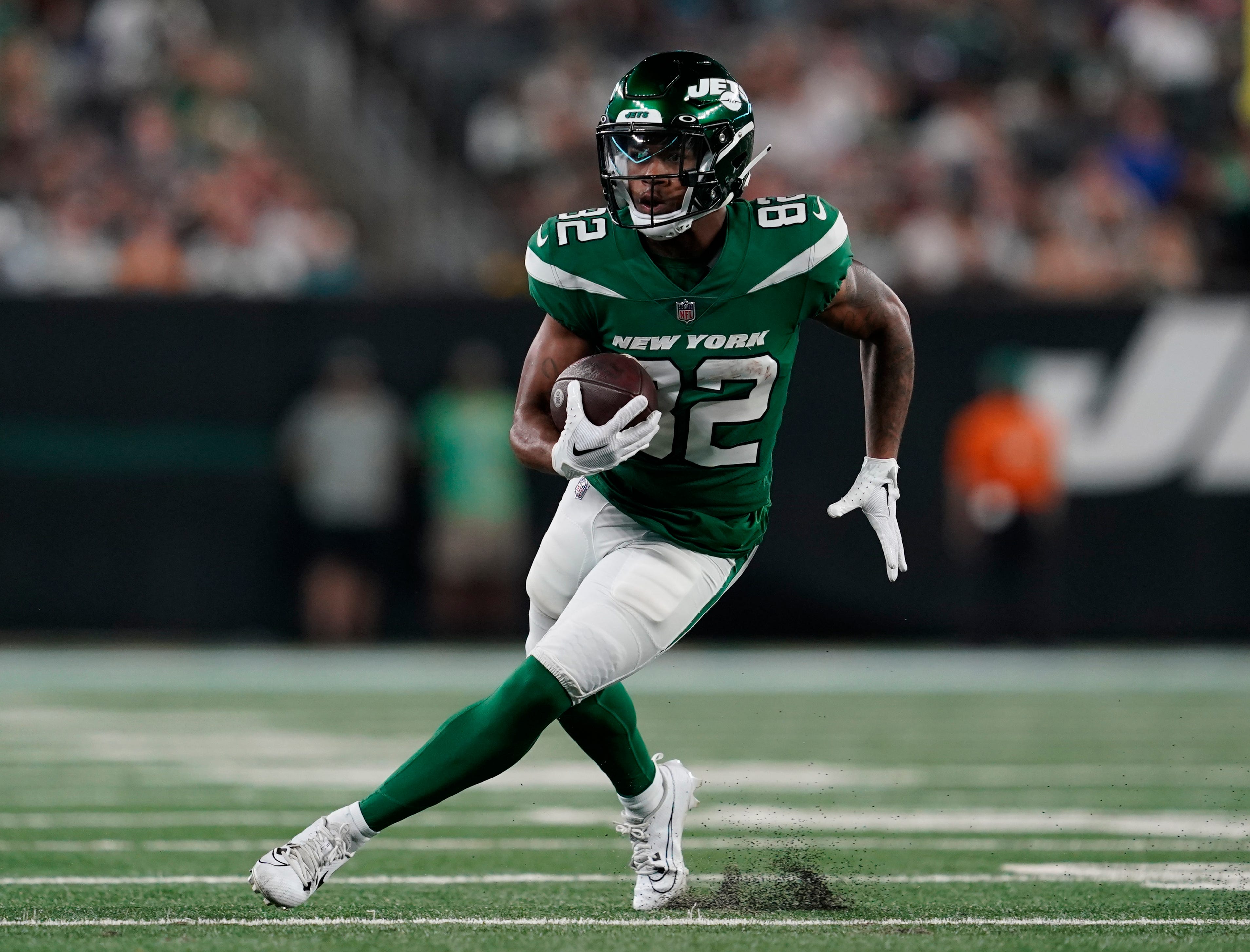 New York Jets wide receiver Xavier Gipson (82) runs with the ball in the second half. The Buccaneers defeat the Jets, 13-6, in a preseason NFL game at MetLife Stadium on Saturday,