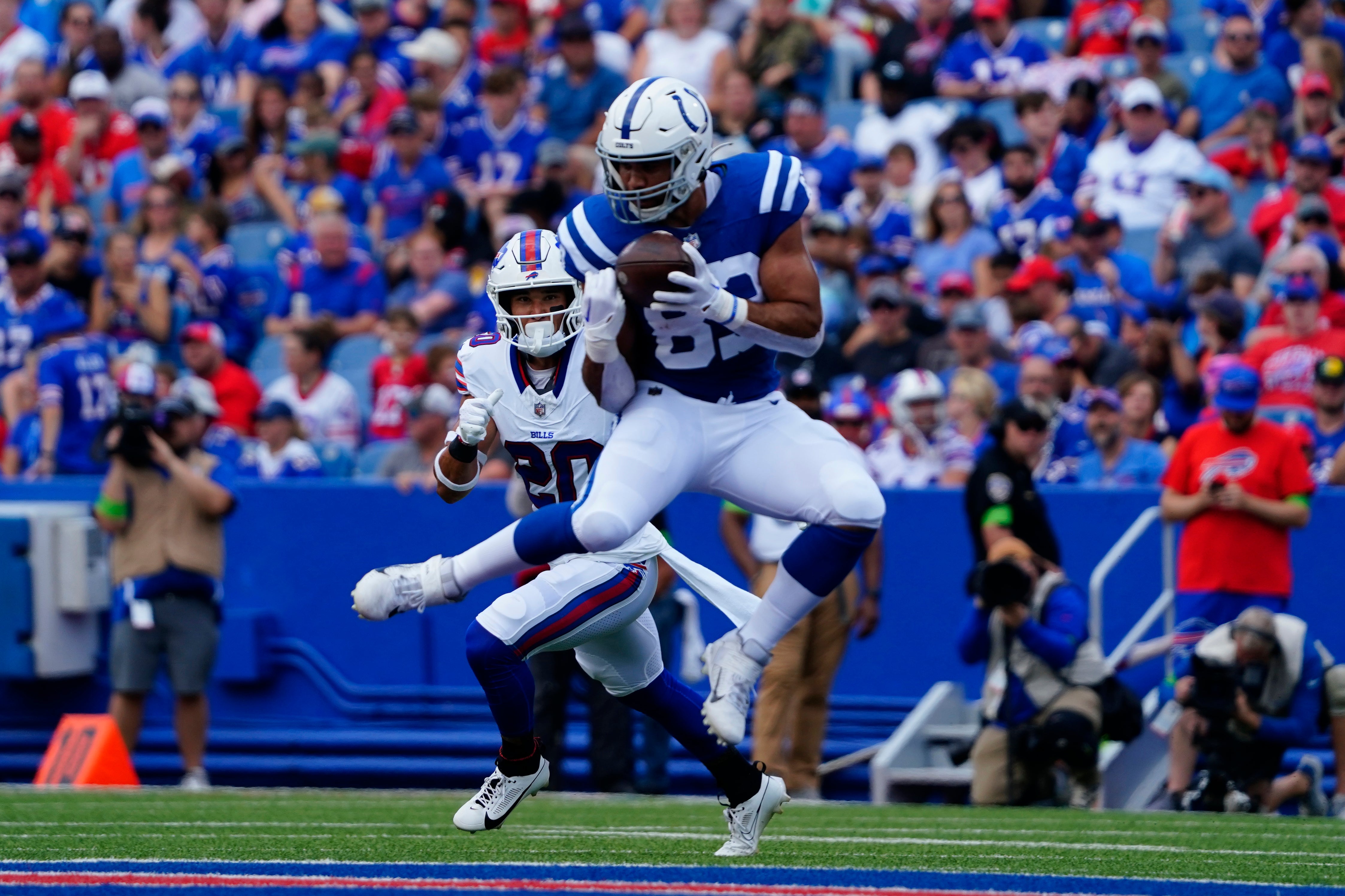 Aug 12, 2023; Orchard Park, New York, USA; Indianapolis Colts tight end Kylen Granson (83) makes a catch against the Buffalo Bills during the first half at Highmark Stadium.
