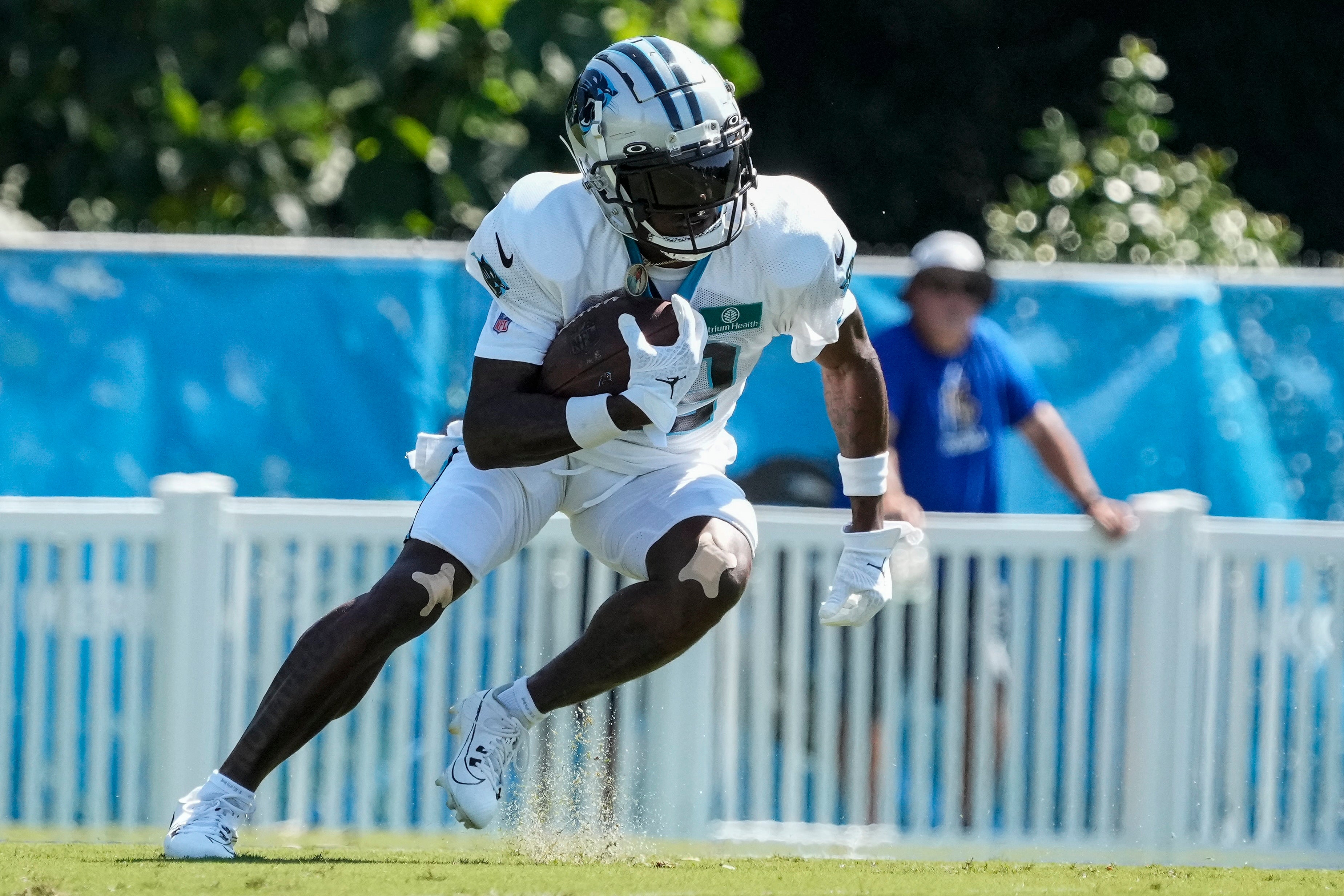 Jul 31, 2023; Spartanburg, SC, USA; Carolina Panthers wide receiver Jonathan Mingo (15) runs back a kick during training camp at Wofford College. Mandatory Credit: Jim Dedmon-USA TODAY Sports